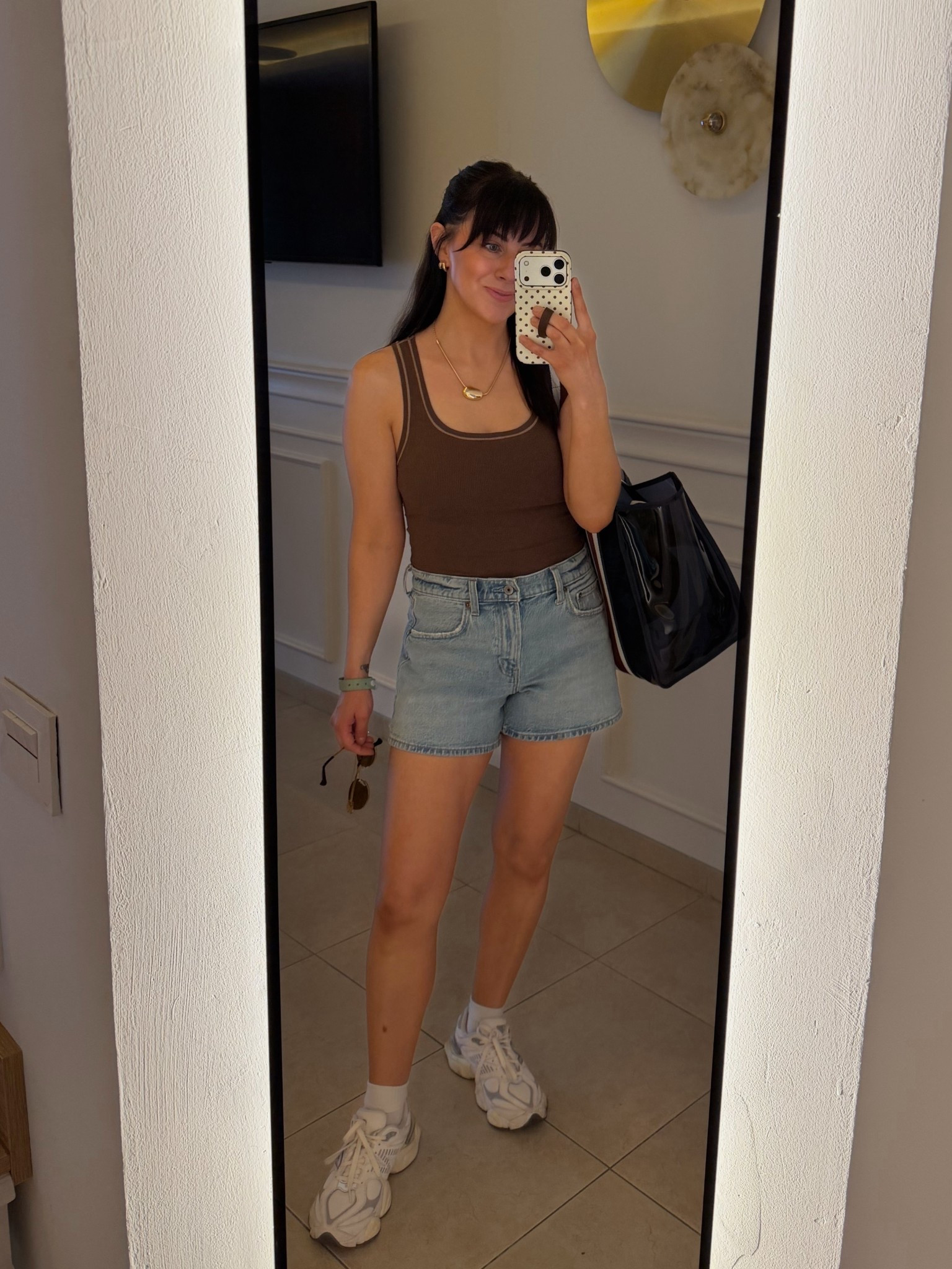 Simple easy spring and summer vacation outfit for an excursion day! Mom friendly! Top has a built in bra that’s actually supportive. Wearing s, 27 shorts (size up one), sneakers tts & head to my stories cause I’m giving away a pair this month!

Beach outfits resort, spring outfits 2026, jean shorts 

#LTKPetite #LTKSeasonal #LTKootd