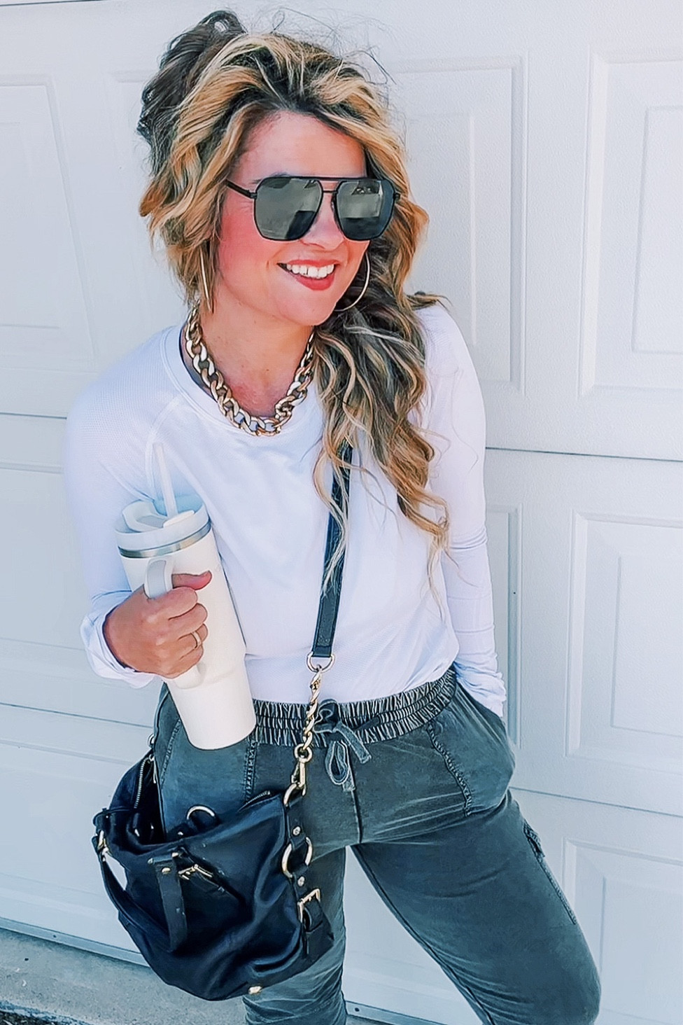Edgy outfit ideas. I’m obsessed with simple beautiful clothing that is easy!! Athleisure is Americas favorite because we love comfort! Jazz up all your athletic outfits with a touch of glam. Your matte shades immediately add style! A huge leather bag with chunky gold adds massive edge. With gold necklace and hoops. My leather sneakers are sooo good by Mia Nordstrom rack. My top is super comfortable and classy by Athletia. Cargo style pants are trending for fall 2023! Check out my top picks. And of course my Stanley. Smash follow for edgy outfit ideas. Amazon outfit ideas. Nordstrom outfit ideas. #fashion #styling #stylishoutfits #styletips #dressing #clothes #medium #classy 

#LTKFind #LTKunder100 #LTKstyletip