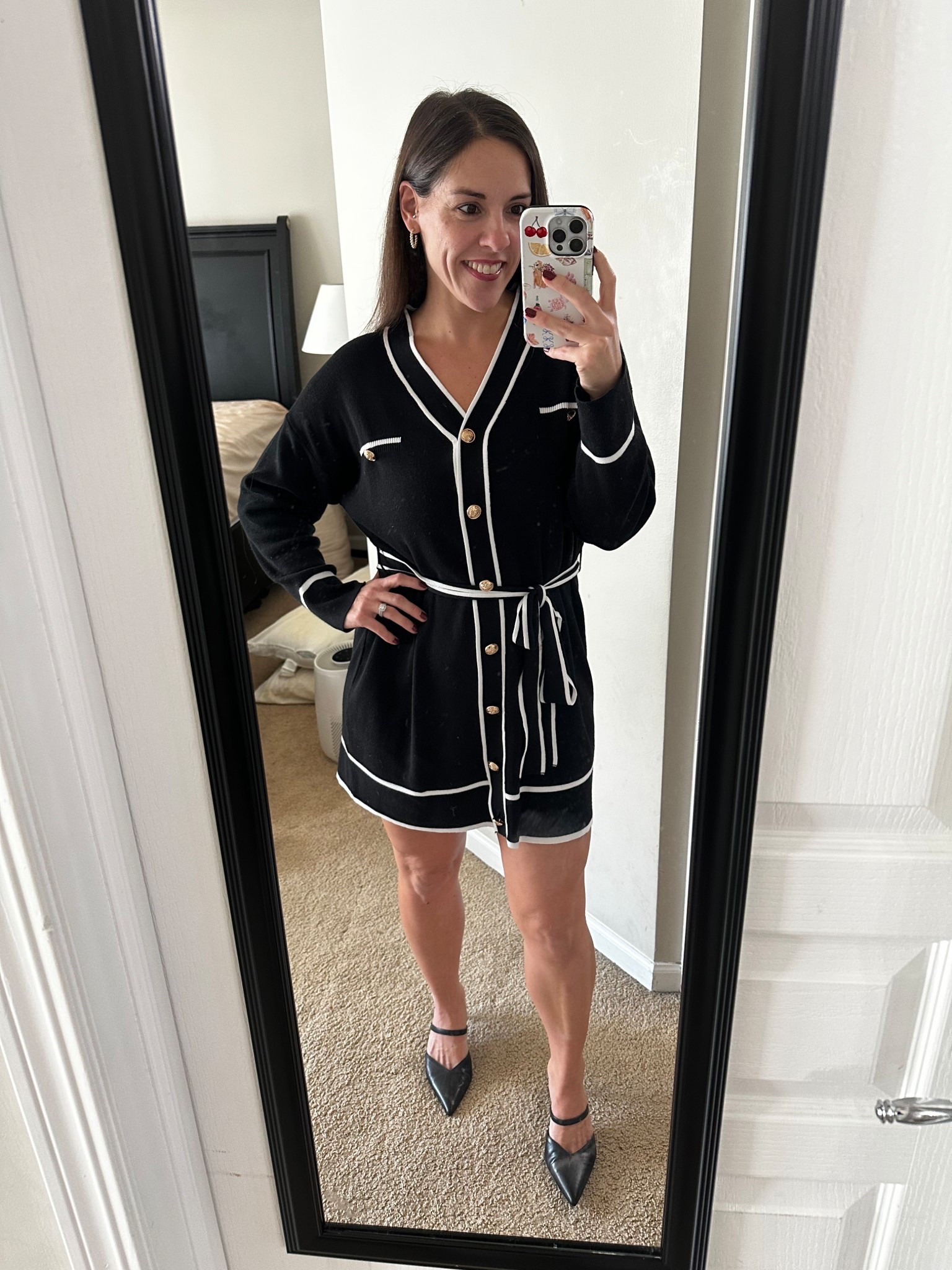 This black knit sweater dress is the perfect mix of classy and comfortable. The gold buttons and white trim give it that elevated look making it ideal for events, church, or professional settings. True to size (wearing small).



#LTKPetite #LTKShoeCrush #LTKootd