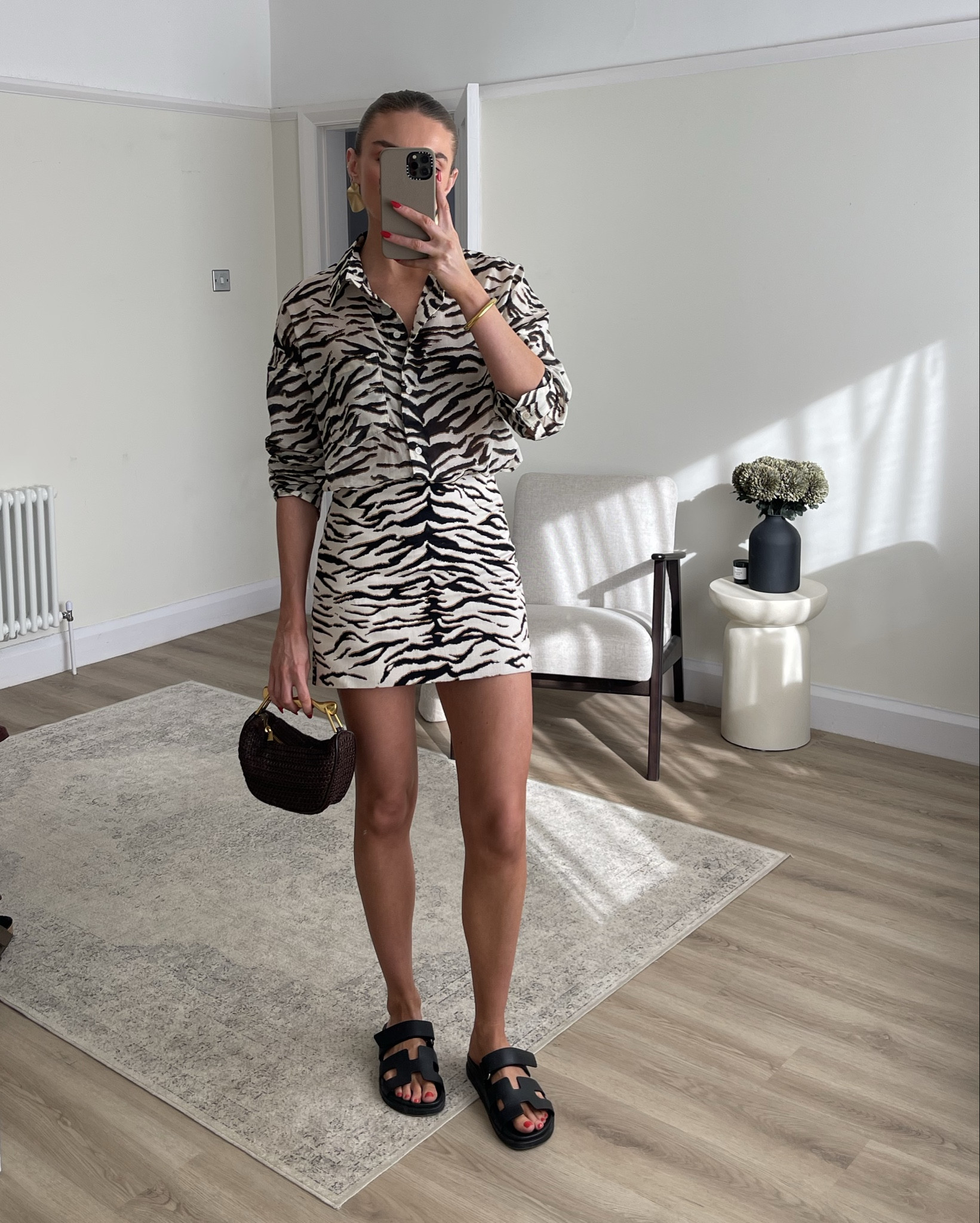 H&M new in 
Wearing a small in the zebra shirt 
An 8 in the zebra skirt 
Zara bag 
Hermes black sandals - dupes linked 

#LTKspring #LTKuk