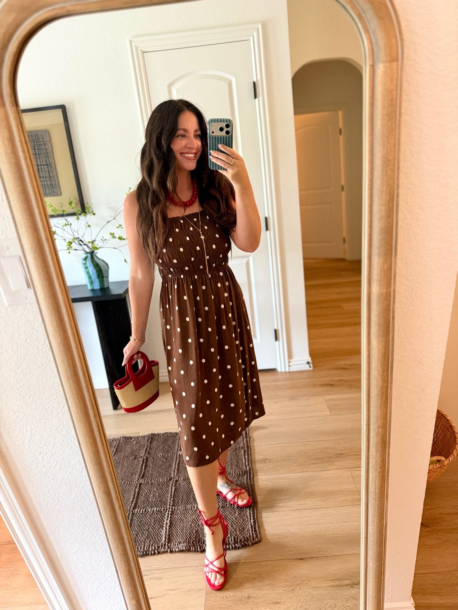 Polka dot midi dress and red accessories

#LTKootd #LTKTravel