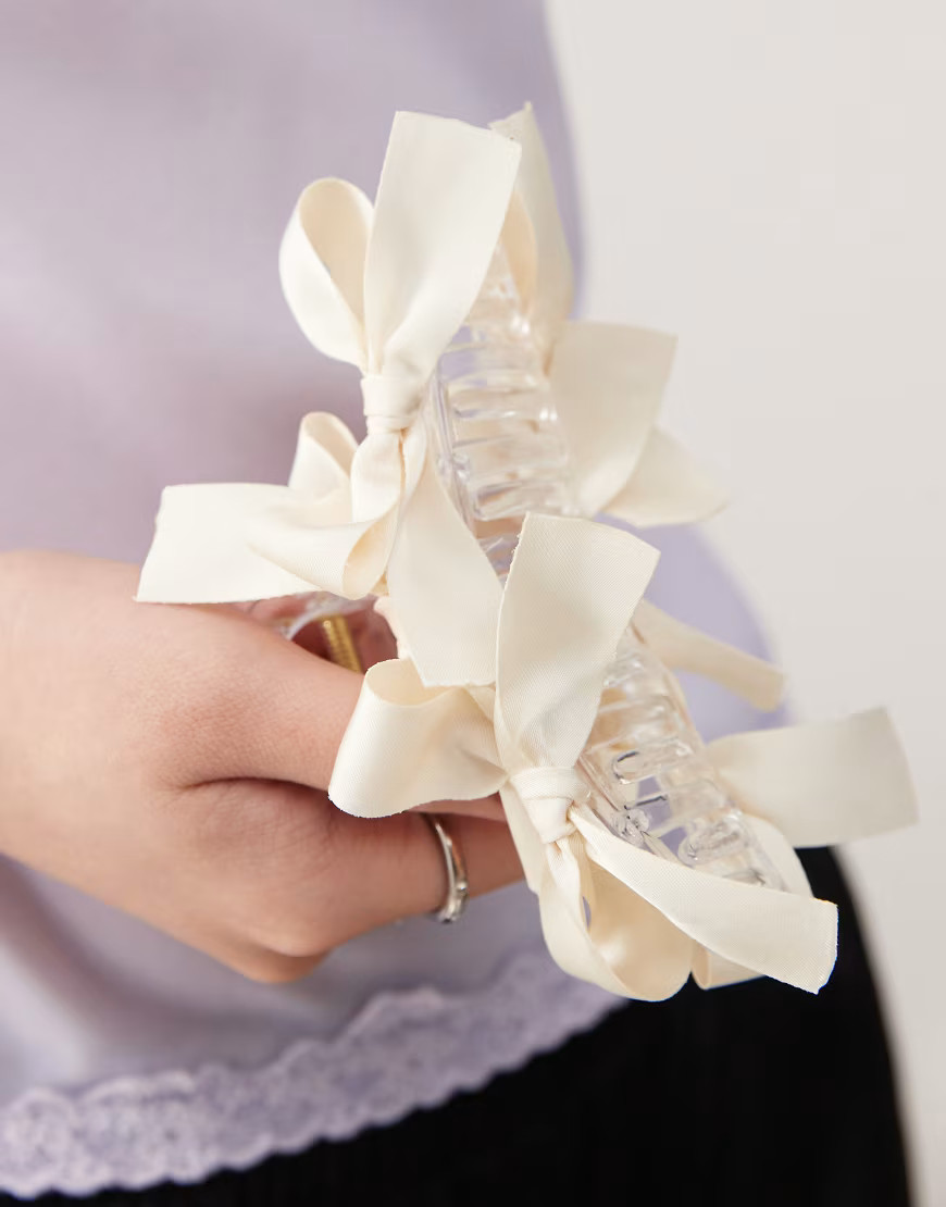 Reclaimed Vintage claw clip with bows in cream-White | ASOS (Global)
