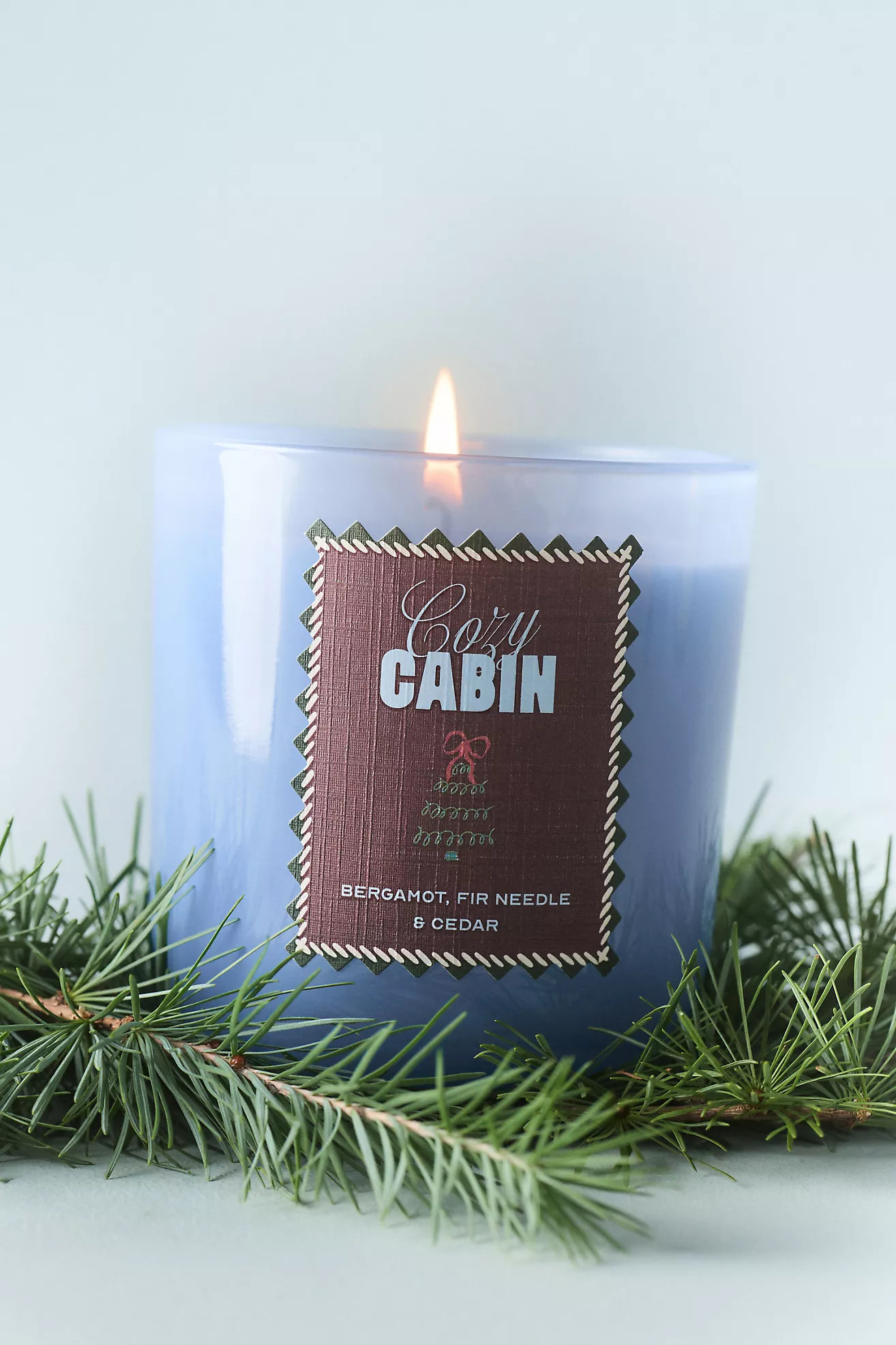 Anthropologie x Papier Woody Cozy Cabin Boxed Glass Candle | Anthropologie (US)