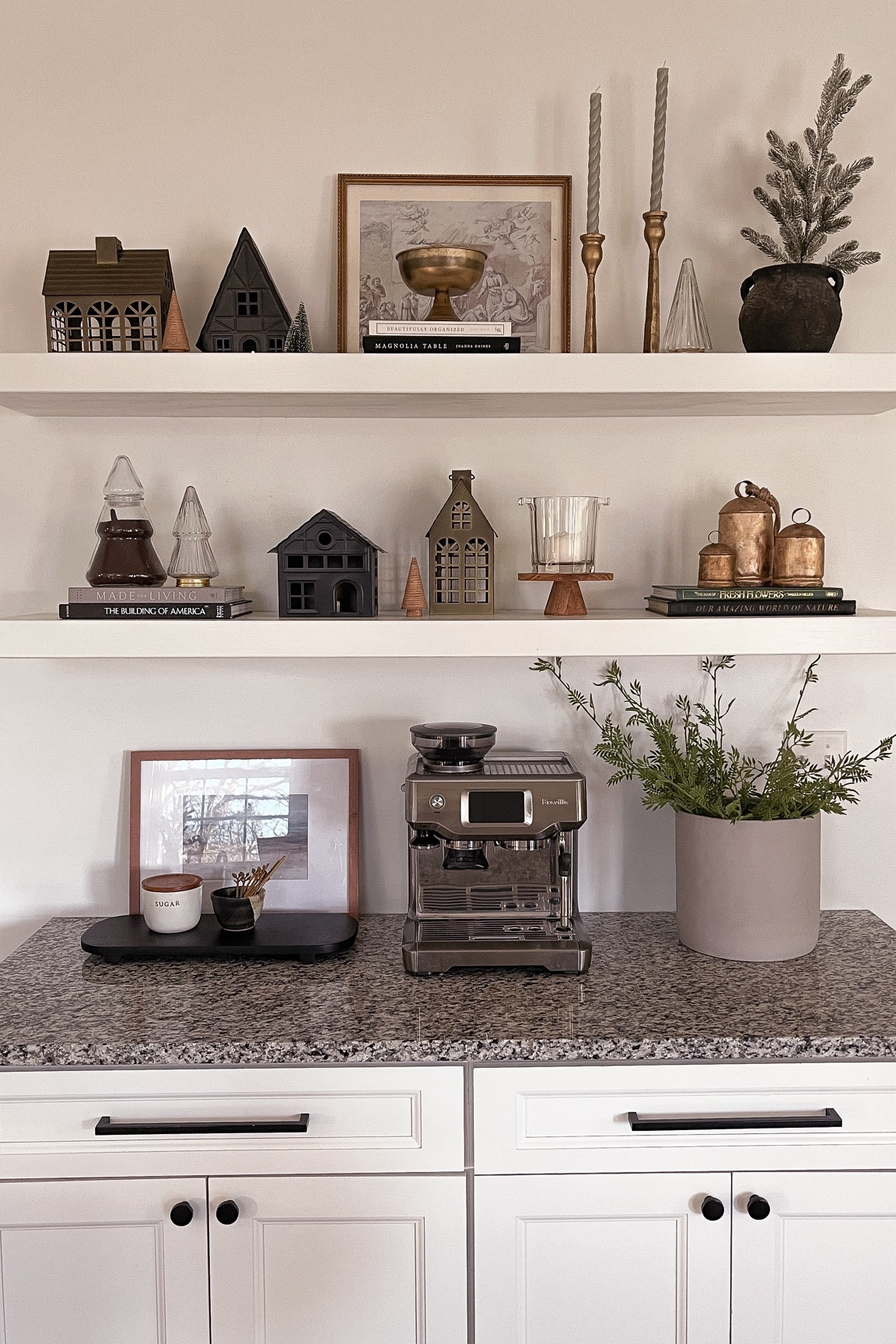 Christmas decorated kitchen floating shelves. Target christmas houses, gold bells, white floating shelves, modern organic decor

#LTKhome #LTKSeasonal #LTKHoliday