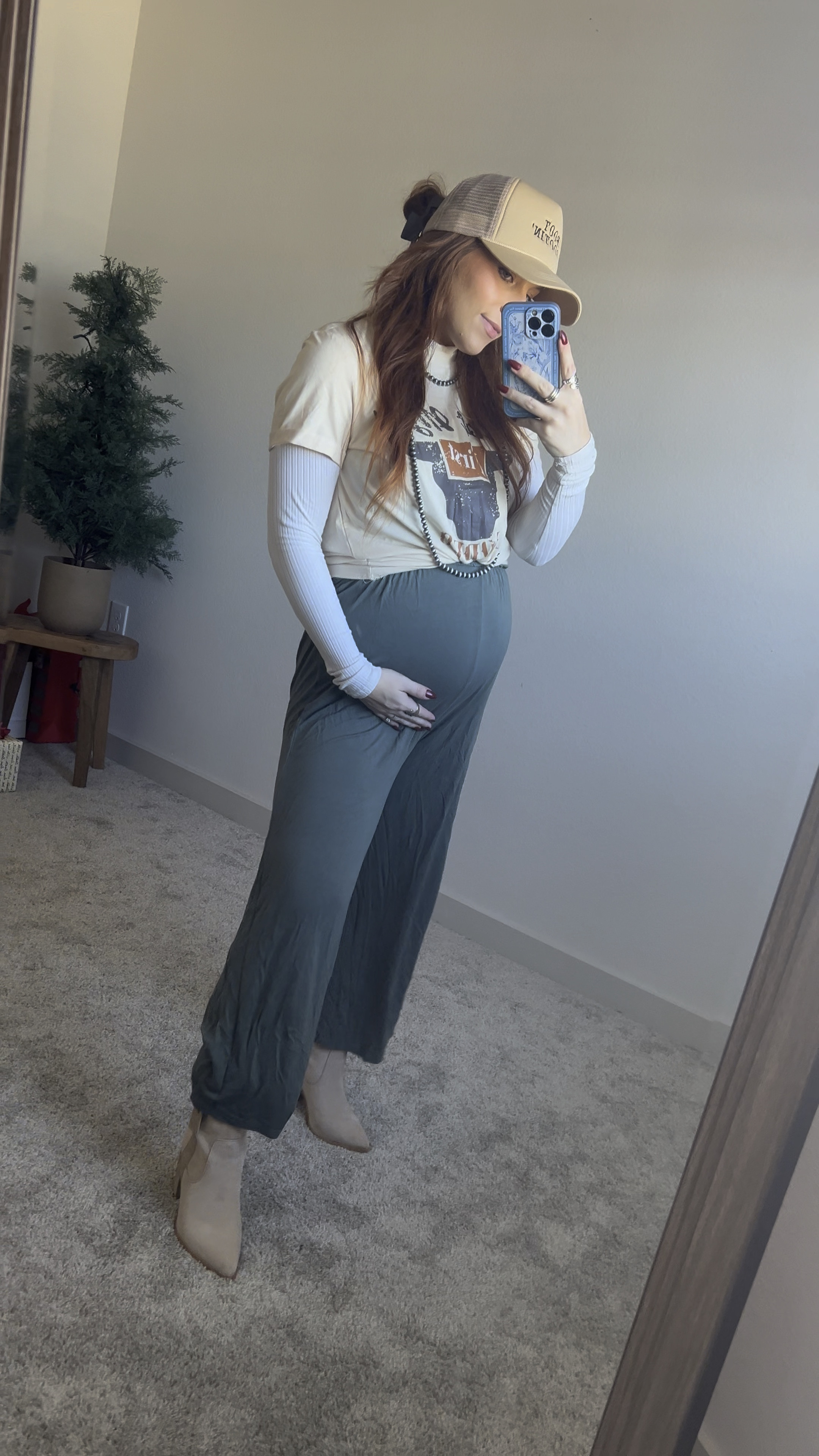 My OOTD - Western Inspired - Earthbound Green Jumpsuit - Skims Turtleneck Long Sleeve - Shein Not My First Rodeo TShirt - Shein Boots - Wrap around beaded necklace - Altar’d State Trucker Hat - Spoon Rings

#LTKshoecrush #LTKbump #LTKstyletip