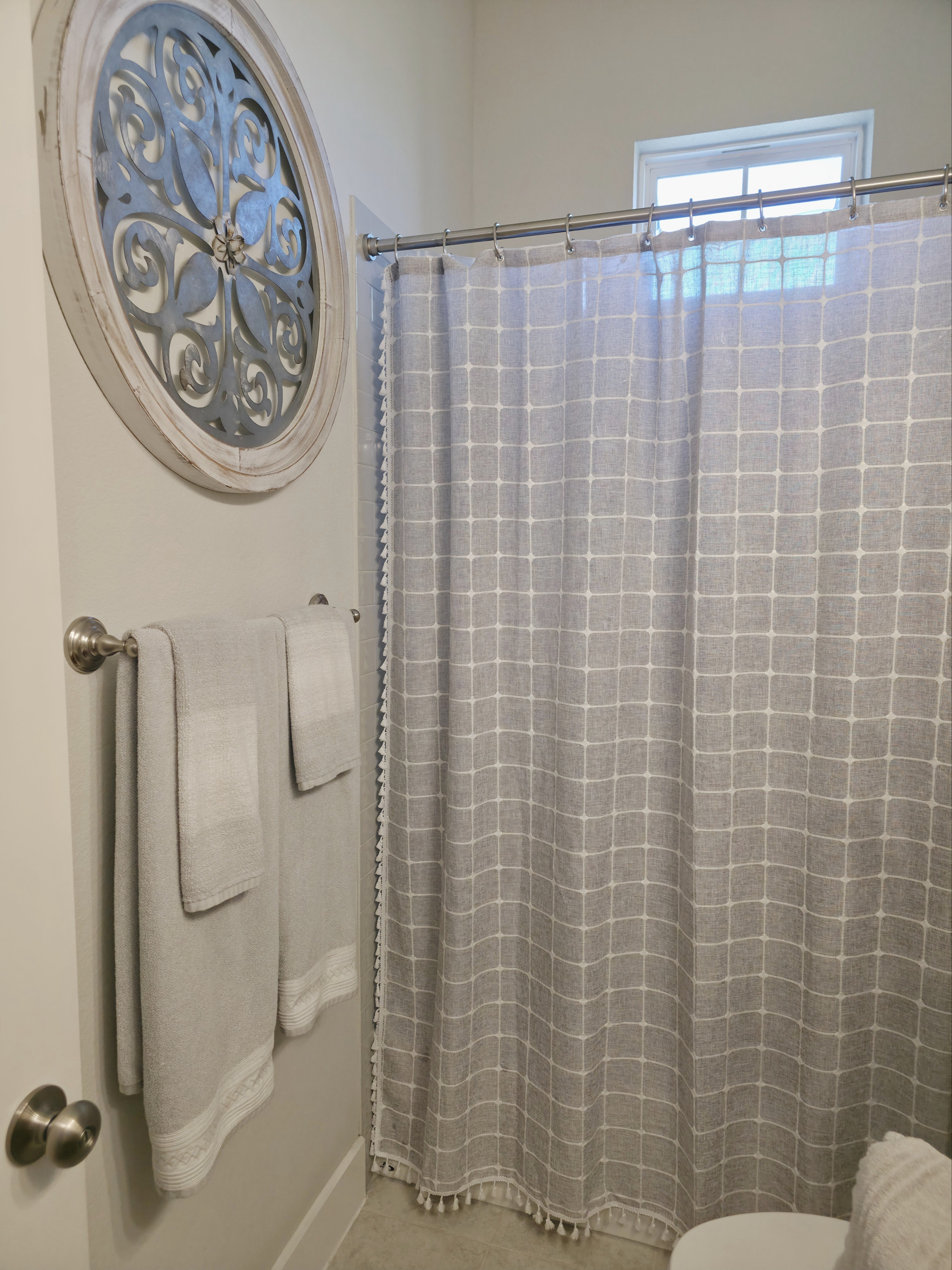 Obsessed with this shower curtain 🤍 The quality is sooo good and the tassel detail at the bottom just elevates everything. I have it in gray (54” x 72”), but there are other colors too. 10/10—reviews don’t lie!

