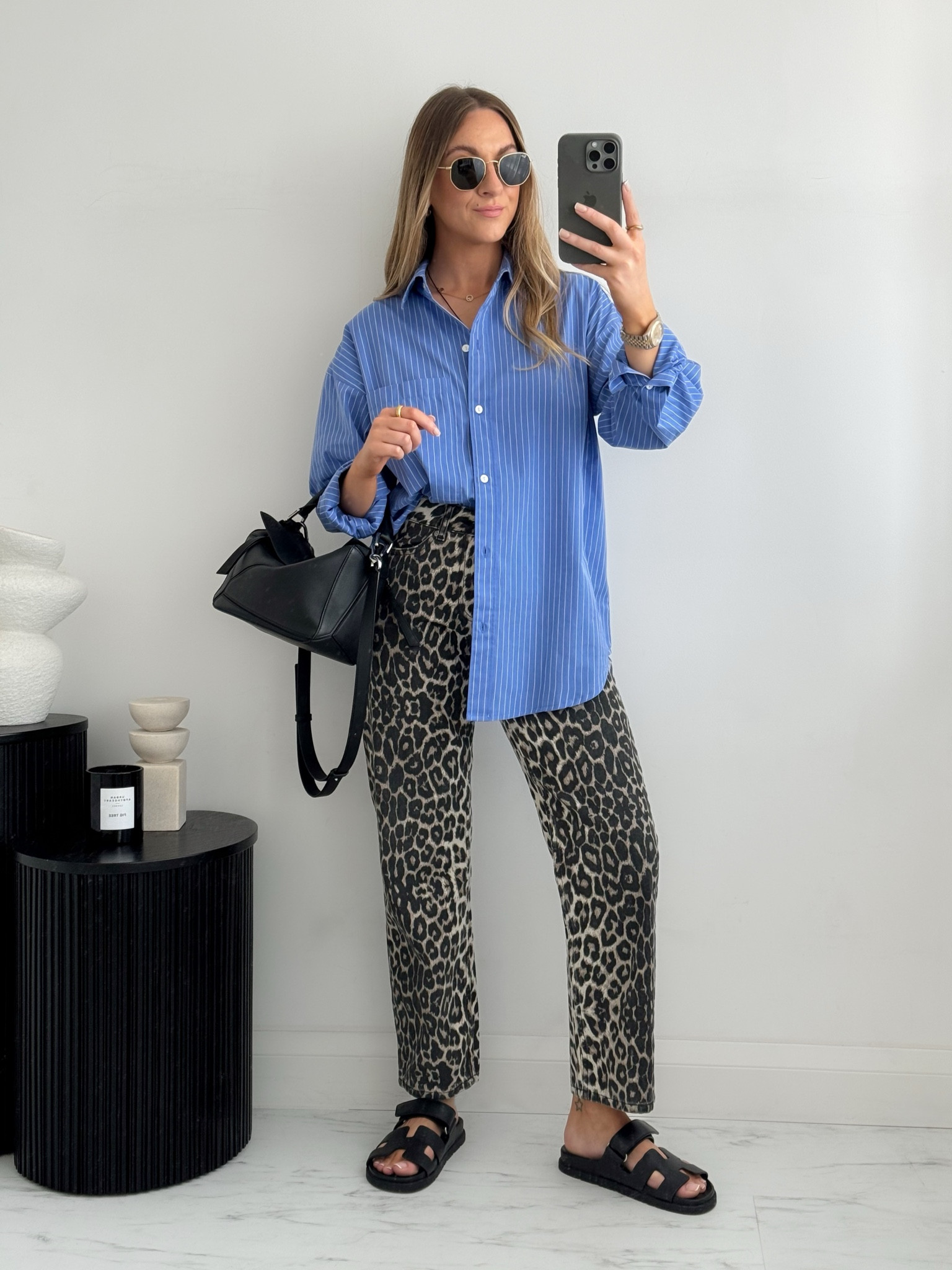 Leopard print jeans & linen shirt outfit. 

#LTKsummer #LTKluxury #LTKstyletip