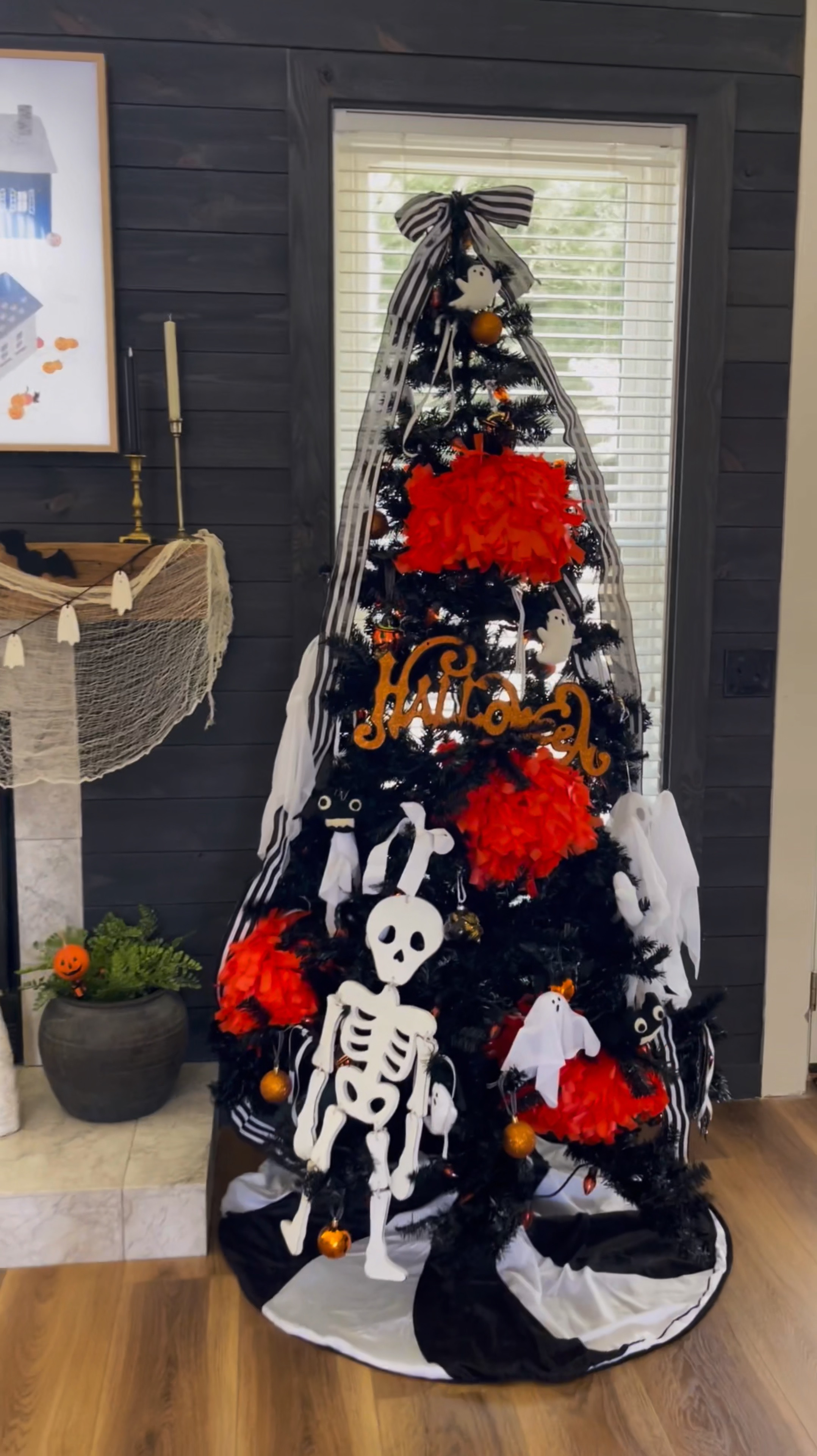 Our Halloween tree is one of my families favorites! I love turning the flickering orange tree lights on and all the house lights off and watching Halloween movies. 

#LTKHome #LTKSeasonal #LTKVideo