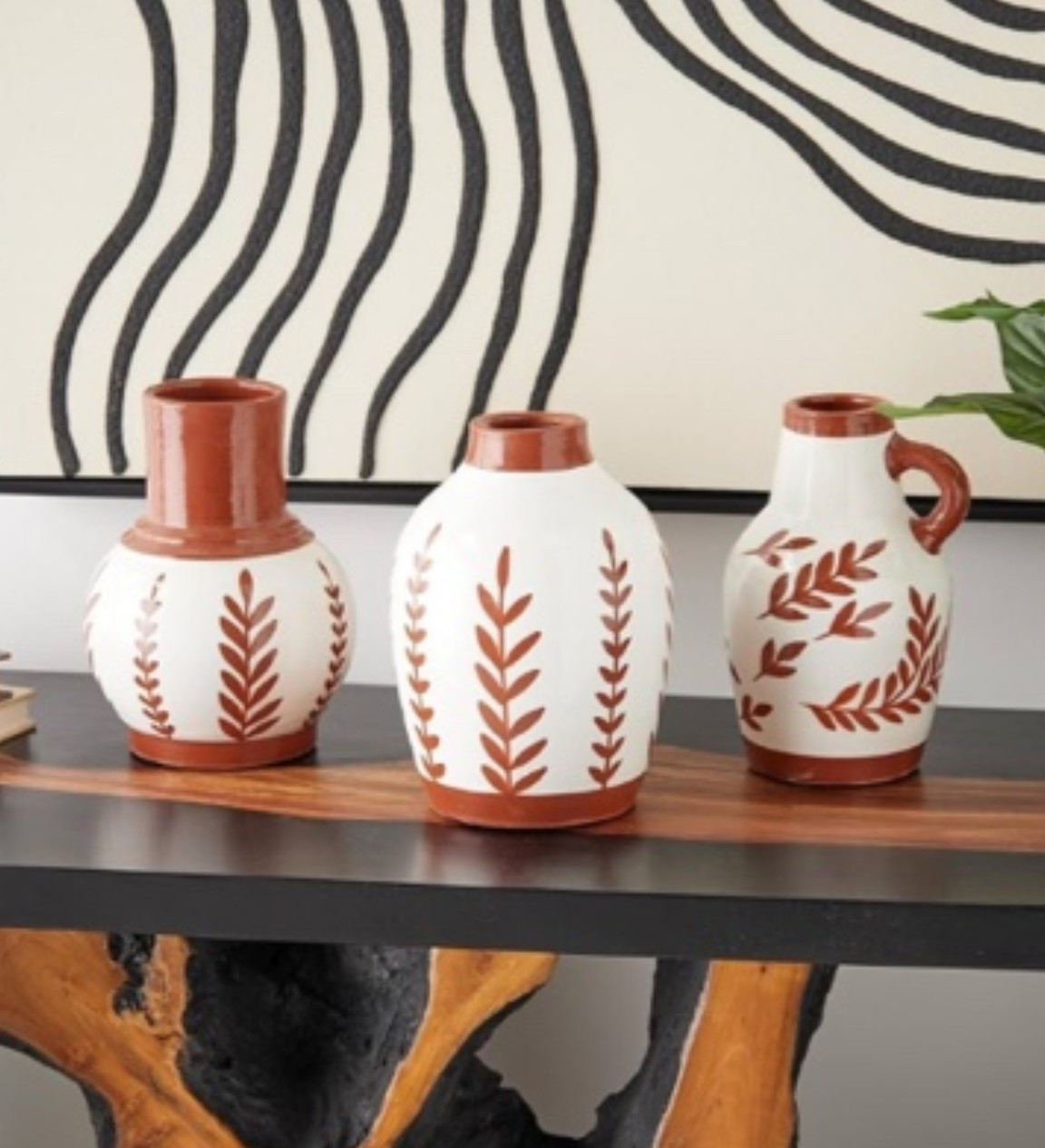 The little home detail that instantly makes a space feel warmer and more elevated. ✨ These ceramic vases are perfect for neutral home decor, coffee table styling, kitchen decor, shelf styling, entry tables, and cozy living room decor. The soft white finish with terracotta detailing adds that warm, collected, effortlessly styled look that goes with everything.

Grab this set now for the easiest home refresh. 🌿

#LTKHome #LTKU #LTKOver40