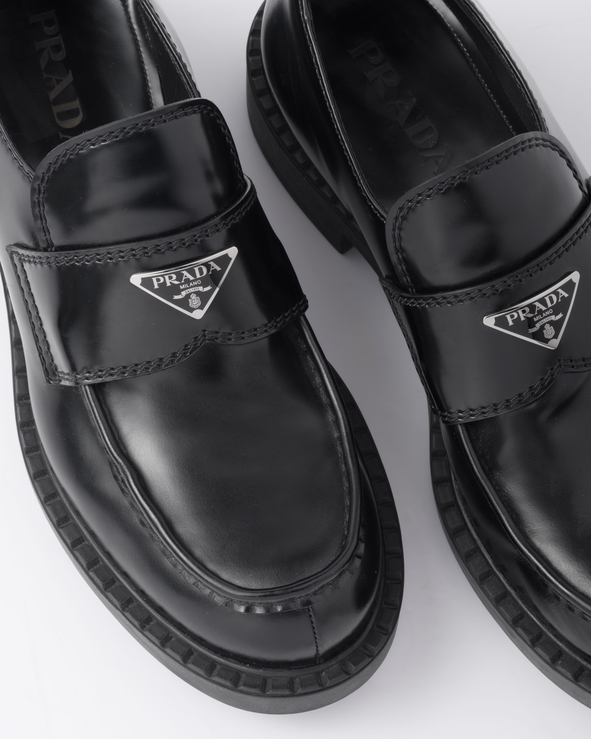 Chocolate brushed leather loafers | Prada US