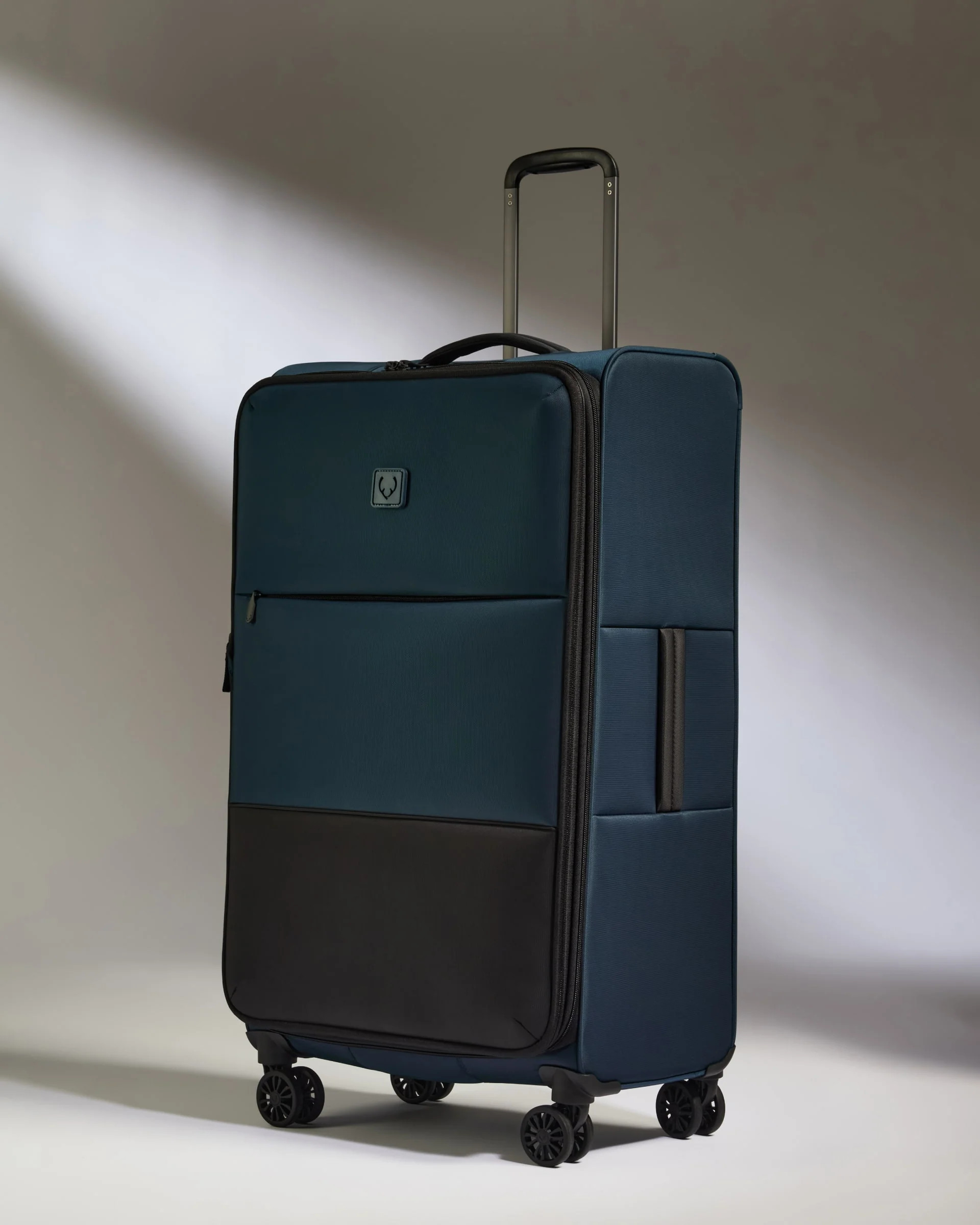 Lightest Large Suitcase in Navy - Soft Stripe 2.0 | Soft Suitcase | Antler USA