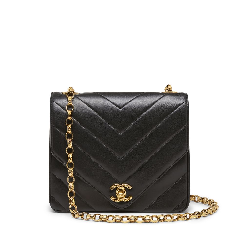 What Goes Around Comes Around Chanel Black Lambskin Chevron Envelope Flap Bag | goop