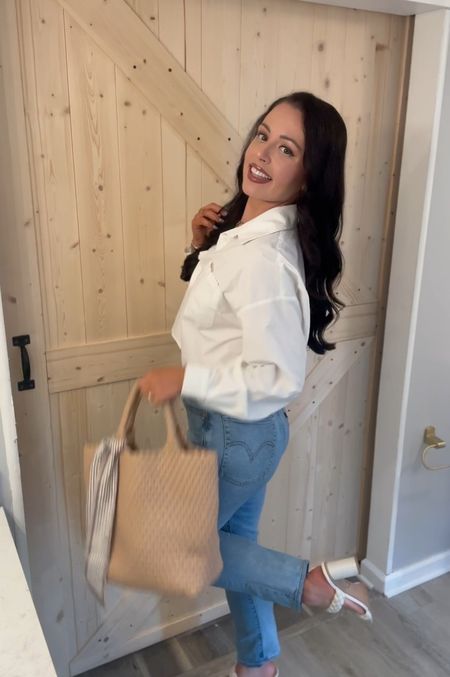 Under $30 amazon cropped white button down (small, 5+ colors), under $50 Levi’s jeans (tts), under $70 amazon bucket tote and under $40 amazon braided heels (tts)— a classic spring outfit! #founditonamazon 

#LTKVideo #LTKGiftGuide #LTKstyletip