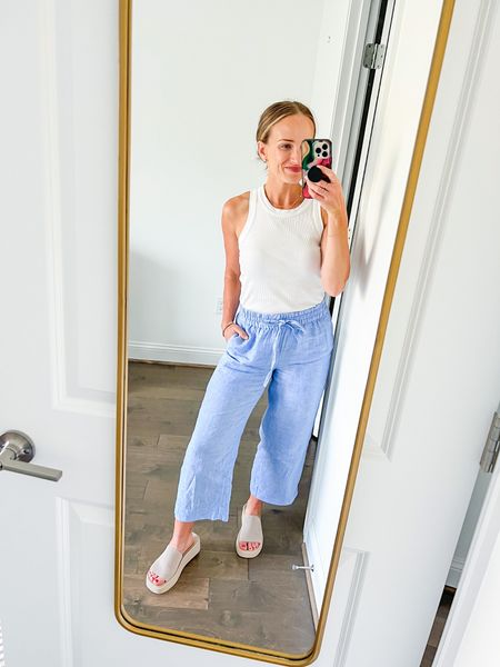 I love these blue wide leg linen pants from jcrew and Amazon high neck white tank, and platform sandals. Size down in the sandals, and get your true size and the rest!

#LTKSeasonal#LTKFind#LTKstyletip