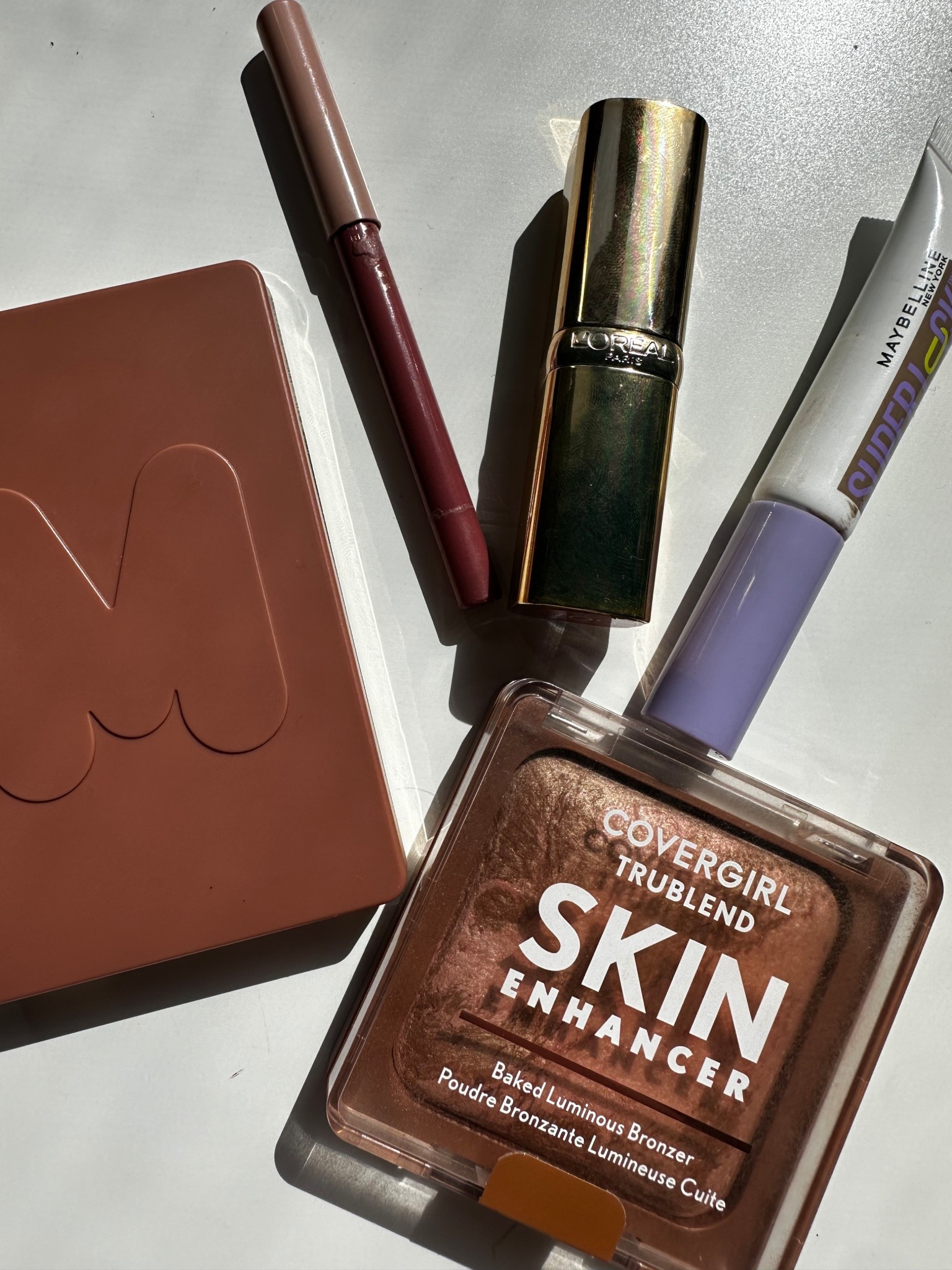 Some of my favorite drugstore makeup finds that are just as good as their high end counter part - products listed below.

1. Covergirl skin enhancer bronzer
2. Loreal lipstick shade worth it
3. Maybelline super lock brow glue
4. Morphe multi finish face trio
5. Maybelline lipliner shade big lift 

#drugstoremakeup #makeupfavorites #affordablemakeup

#LTKselfcare #LTKBeauty #LTKSaleAlert