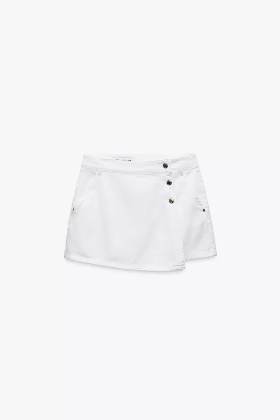 Skort with a high waist with front pockets and back patch pockets. Front wrap closure with hidden... | Zara US