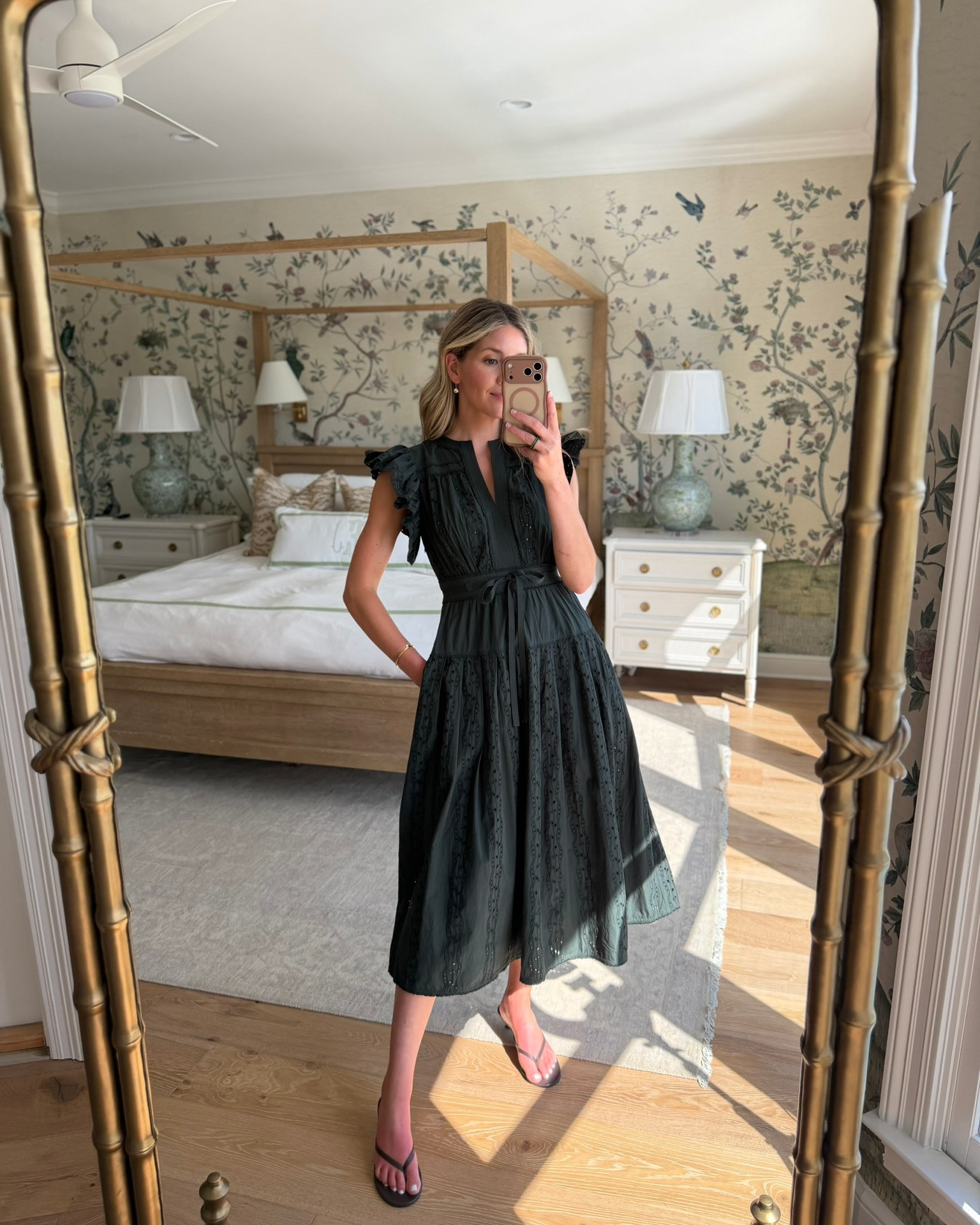 this dress is SO pretty for late summer into fall! i love the deep green, eyelet detail, ruffled sleeves, and tie waist. it feels special enough for dinner or an event, but still easy enough to wear for a daytime lunch or weekend plans.

i’d wear it now with simple sandals, then add ballet flats, a cardigan, or even boots once the weather cools down. one of those dresses that can do a little bit of everything.

#LTKSeasonal #LTKootd