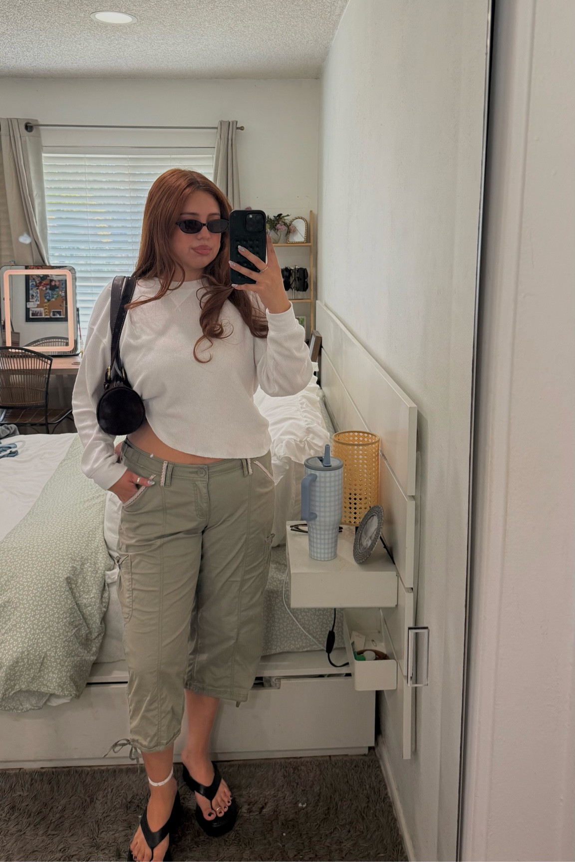 Thermal Top is Old From Hollister 
Bag is From Depop 
Sandals are from Tik Tok Shop
