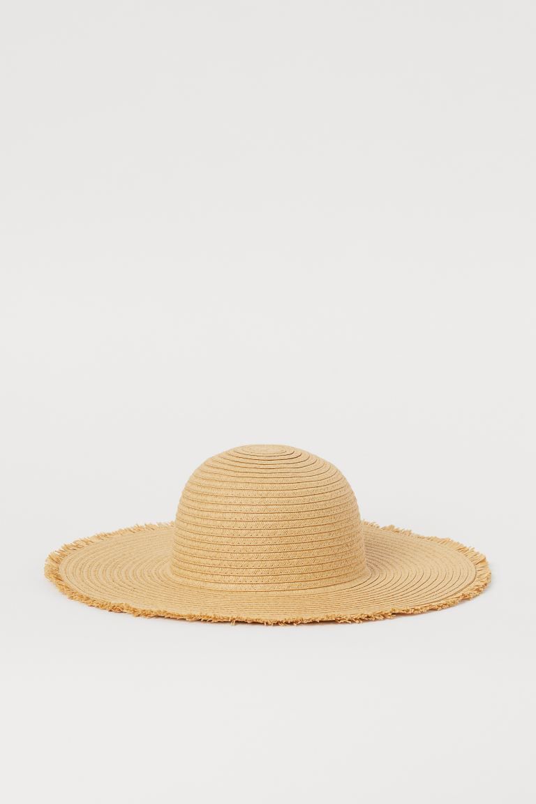 Hat in braided paper straw with fringe-trimmed brim. Width of brim 4 1/4 in. | H&M (US + CA)
