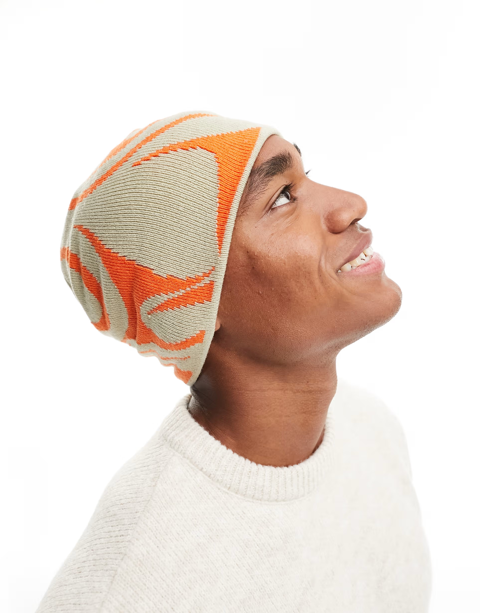 ASOS DESIGN abstract patterned skull beanie in stone and orange | ASOS (Global)
