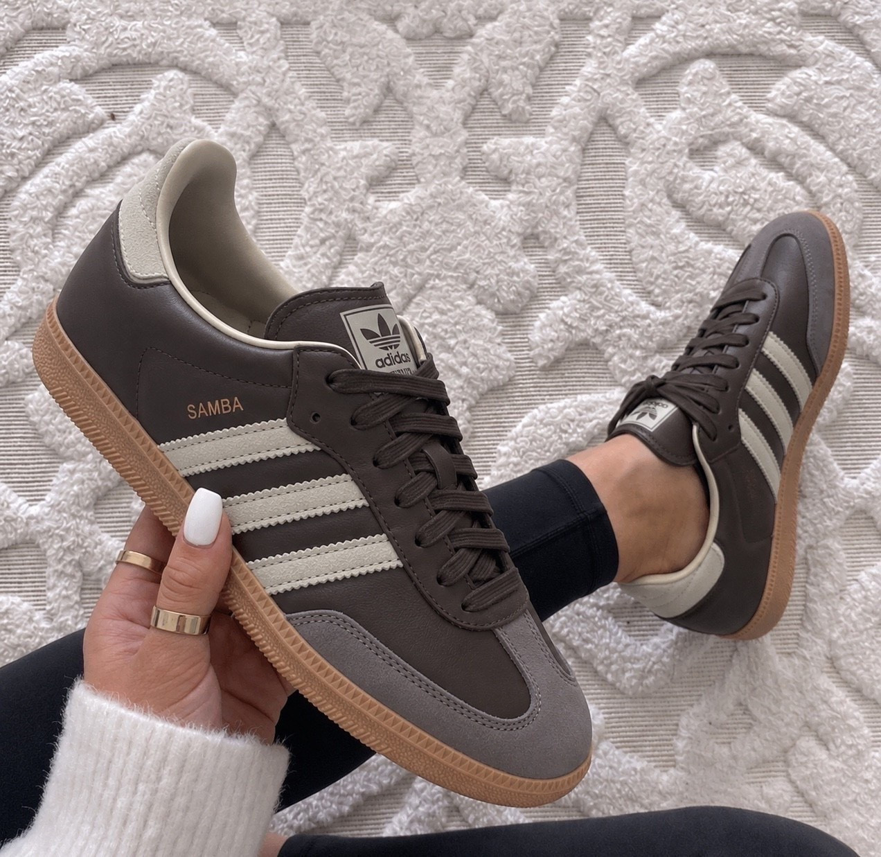 The adidas Samba OG Sneaker is a timeless classic with a sporty chic vibe that instantly elevates any outfit, and this rich brown colorway is perfect for fall. 

They fit true to size, but if you’re between sizes or have wider feet, sizing up a half size can give you a more comfortable fit.