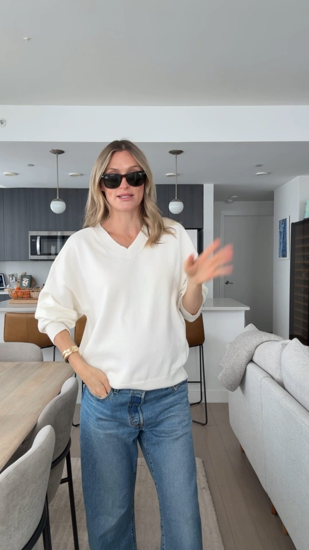 Easy sweater - super stretchy and comfy. Wearing size medium and comes in other colors! 