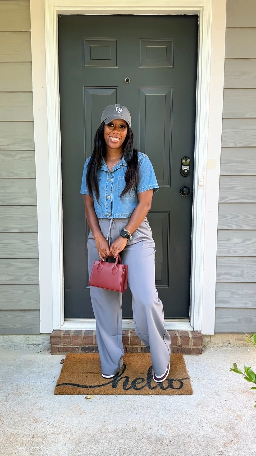 Styling a denim button up crop top with grey pleated pants. I accessorize with a grey baseball hat, burgundy purse, and Jordan 1 Bordeaux sneakers

#LTKOver40 #LTKFindsUnder50 #LTKStyleTip