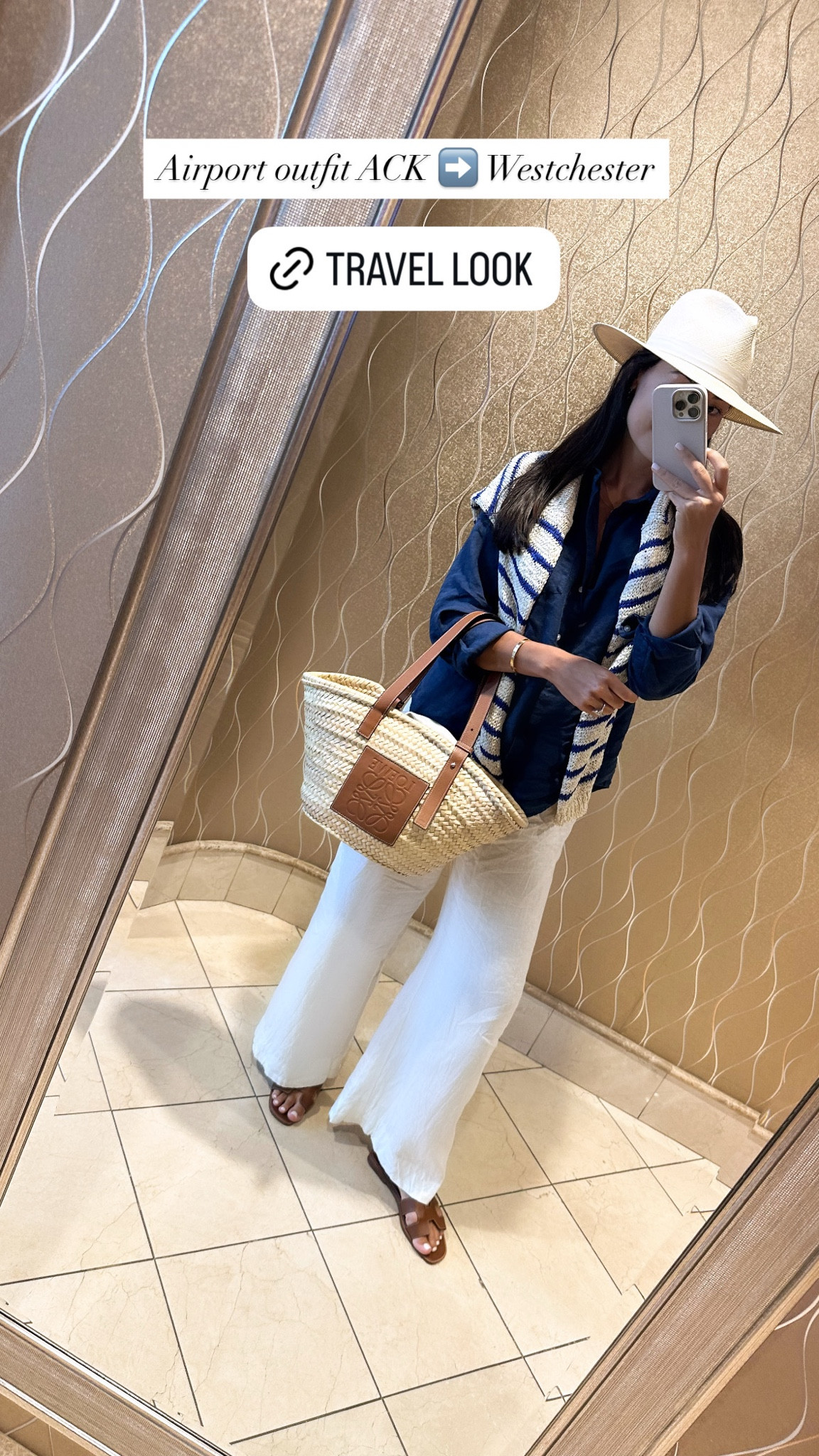 Travel outfit, white linen pants, navy button down, stripe sweater, Loewe tote. 

#LTKTravel #LTKItBag #LTKSeasonal