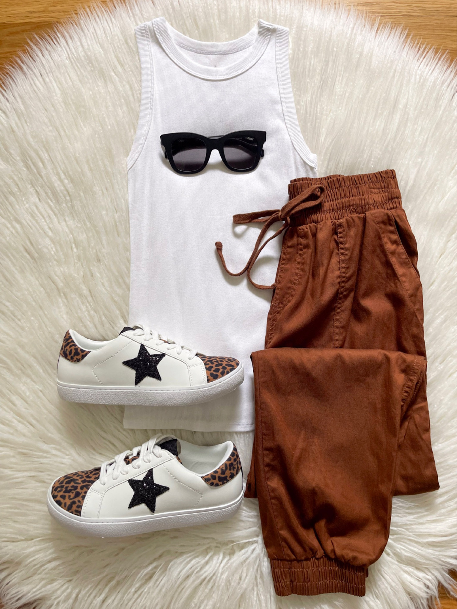 Happy Saturday!  Here’s a comfy look for you today with these new woven jogger’s & sneakers!  Also these tanks are on sale for $6.40- ends today!!  Back to the joggers… these are super comfy and the can be dressed up or down! Definitely recommend!  Hope you all have a great weekend!! 🤗

#LTKsalealert #LTKstyletip #LTKunder50