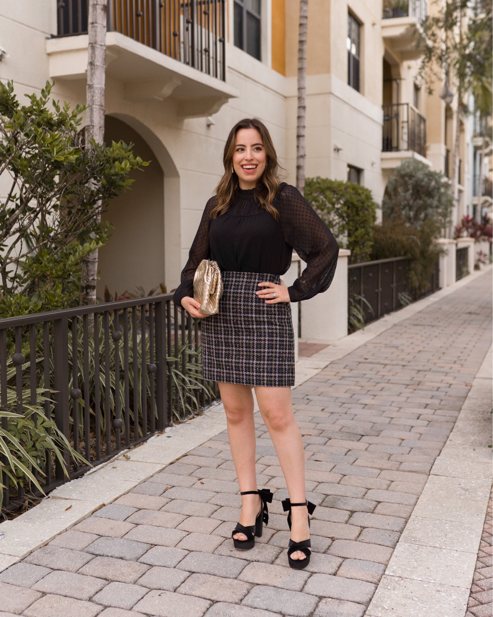 Black top and tweed mini skirt! Perfect Holiday outfit, also great for NYE. Wearing a size XS on the top and 4 in skirt (runs small). Everything is 40% off today!

#LTKSeasonal #LTKsalealert #LTKHoliday