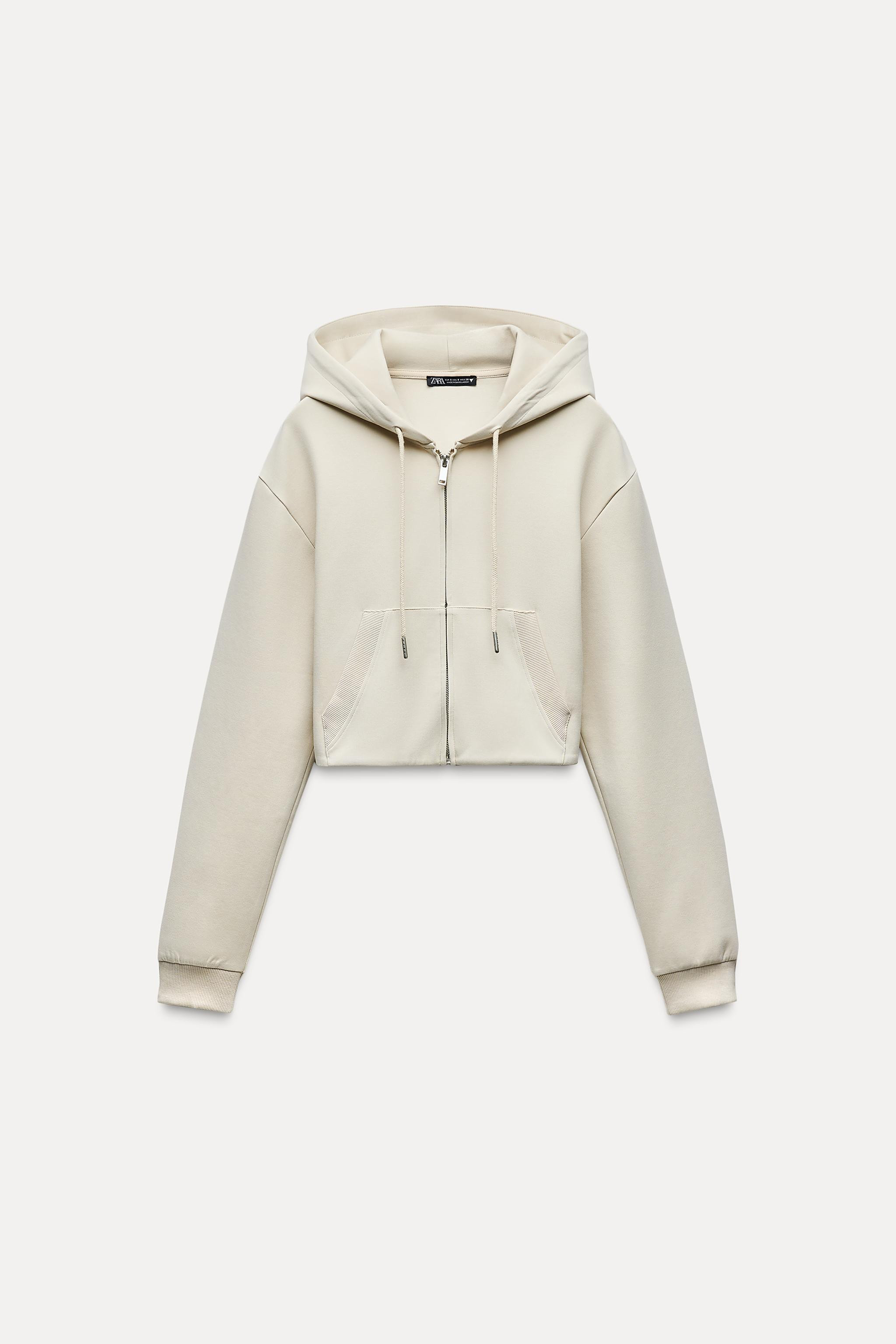 Felpa cropped realizzata in maglia elastica e flessibile con trama compatta, soffice e opaca. Cap... | Zara IT