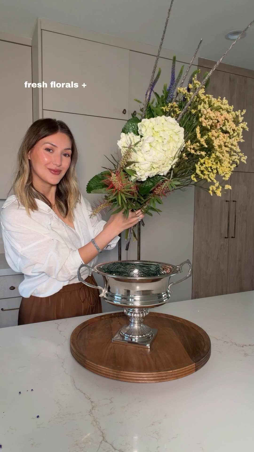 #ad found so many beautiful vases under $100 @Wayfair 💐
decided to make a little DIY floral arrangement for Mother’s Day
fresh florals + decor she can reuse every day just feels more special ✨  
size 8.25” x 13.5” x 10” 
#WayfairPartner #Wayfair #MothersDay

Linking lots of my favorite vases

Spring home
Silver vase 
Chrome vase 
Hand blown vase 
Ceramic vase 
Bud vase 
Glass vase 
Gifts for her 
Home decor 
Wayfair finds 
Mother’s Day gift 







#LTKMothersDay #LTKSeasonal #LTKHome