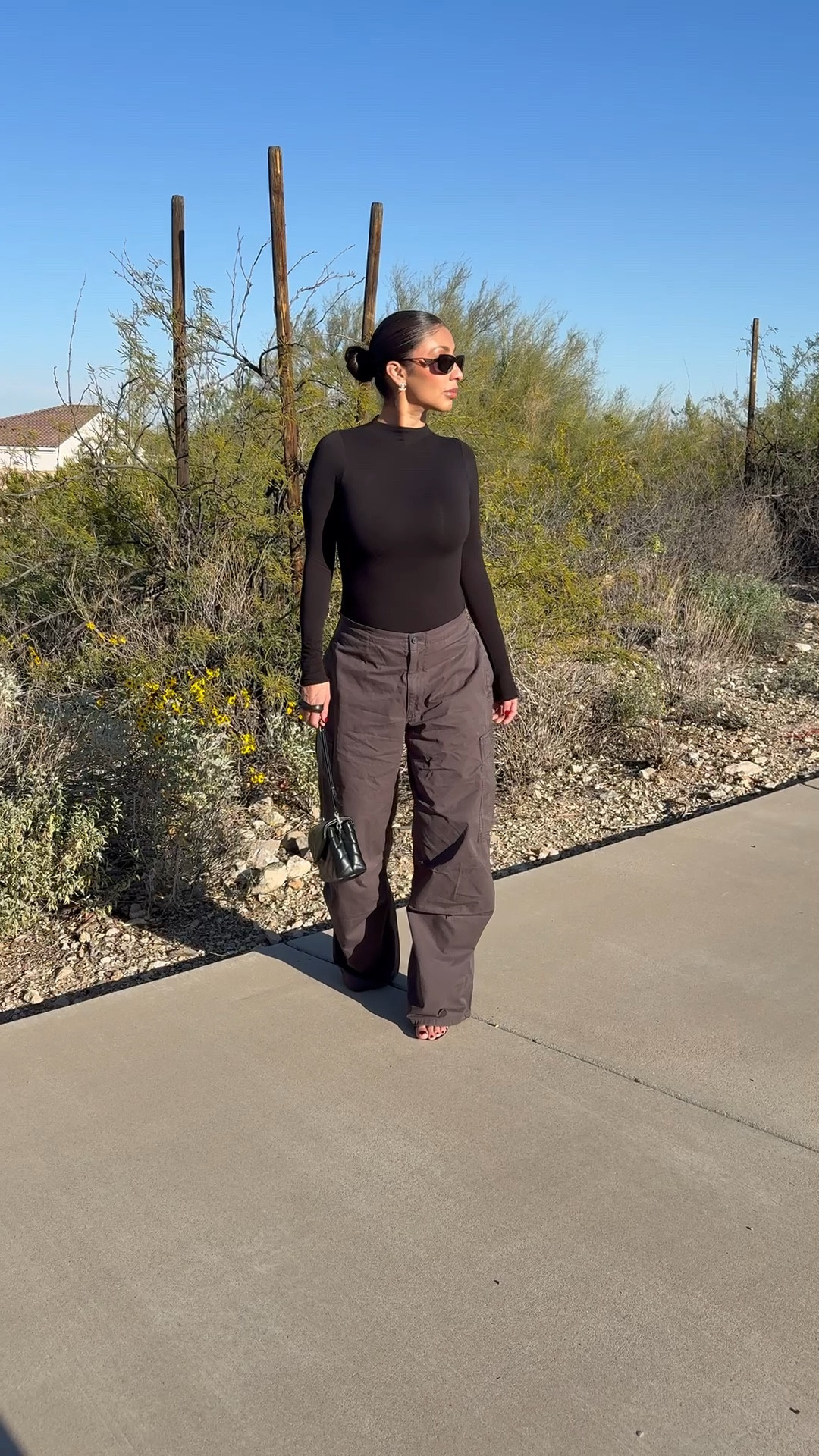 Winter fashion
Oversized cargo pants
Bodysuit 
Sunglasses 
Ootd 
Outfit ideas 

#LTKOver40 #LTKootd #LTKNYFW