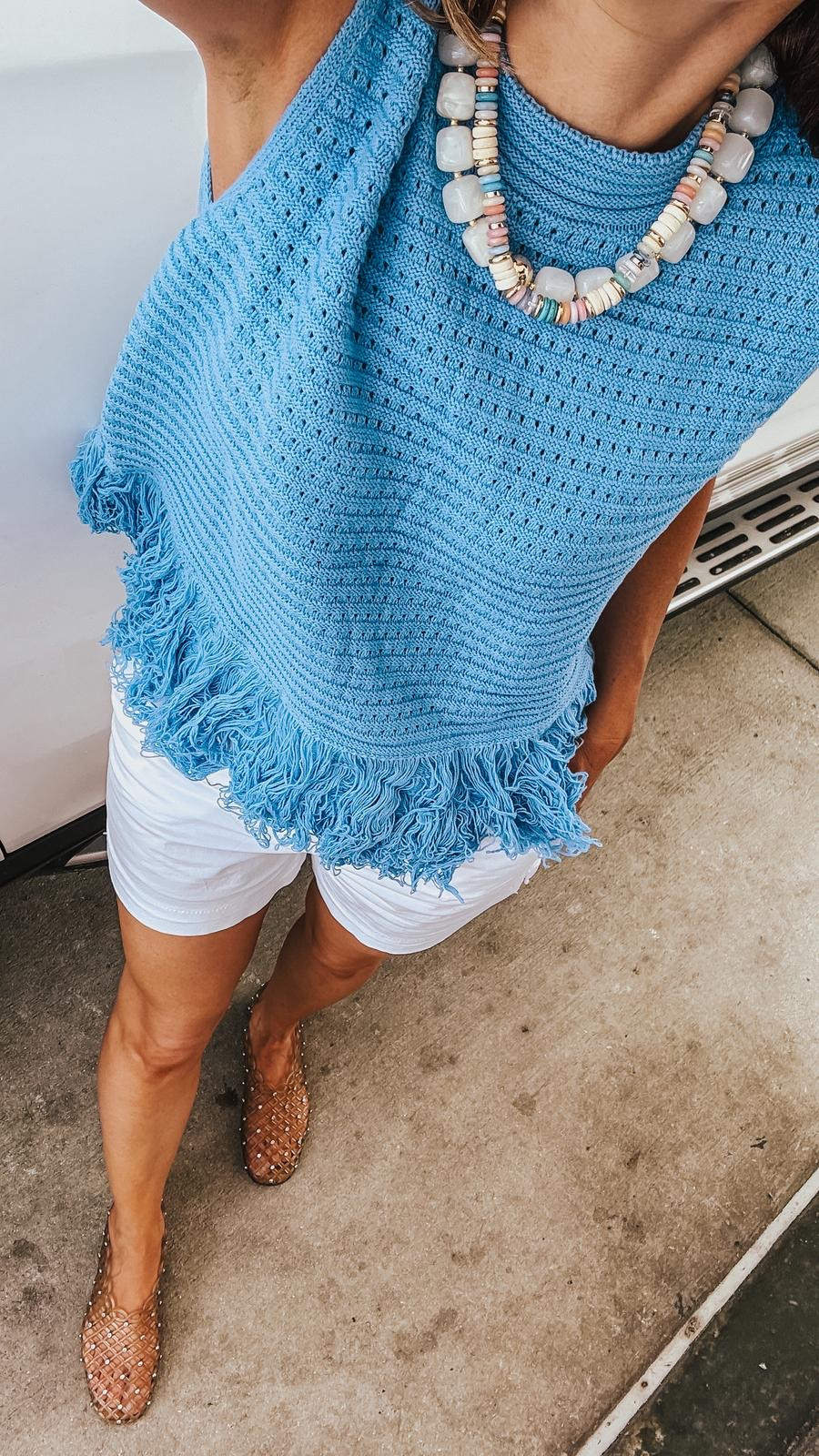 Statement necklaces with a fringe tank top, jelly shoes and canvas shorts for the OOTD. 

 #LTKootd