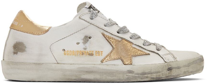 SSENSE Exclusive White & Gold Superstar Sneakers | SSENSE