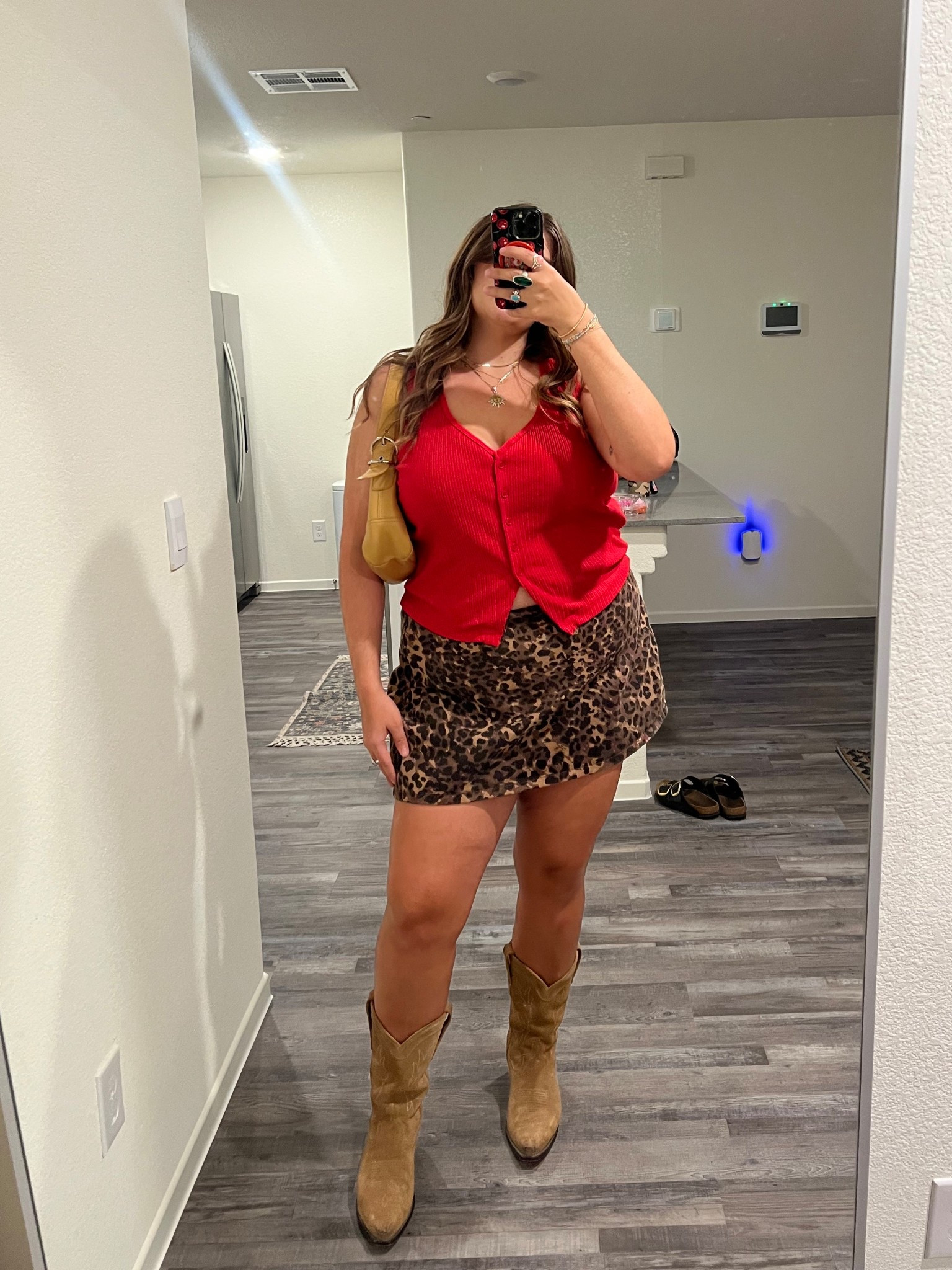 Leopard skirt cowboy boot outfit 

#LTKMidsize #LTKStyleTip #LTKShoeCrush