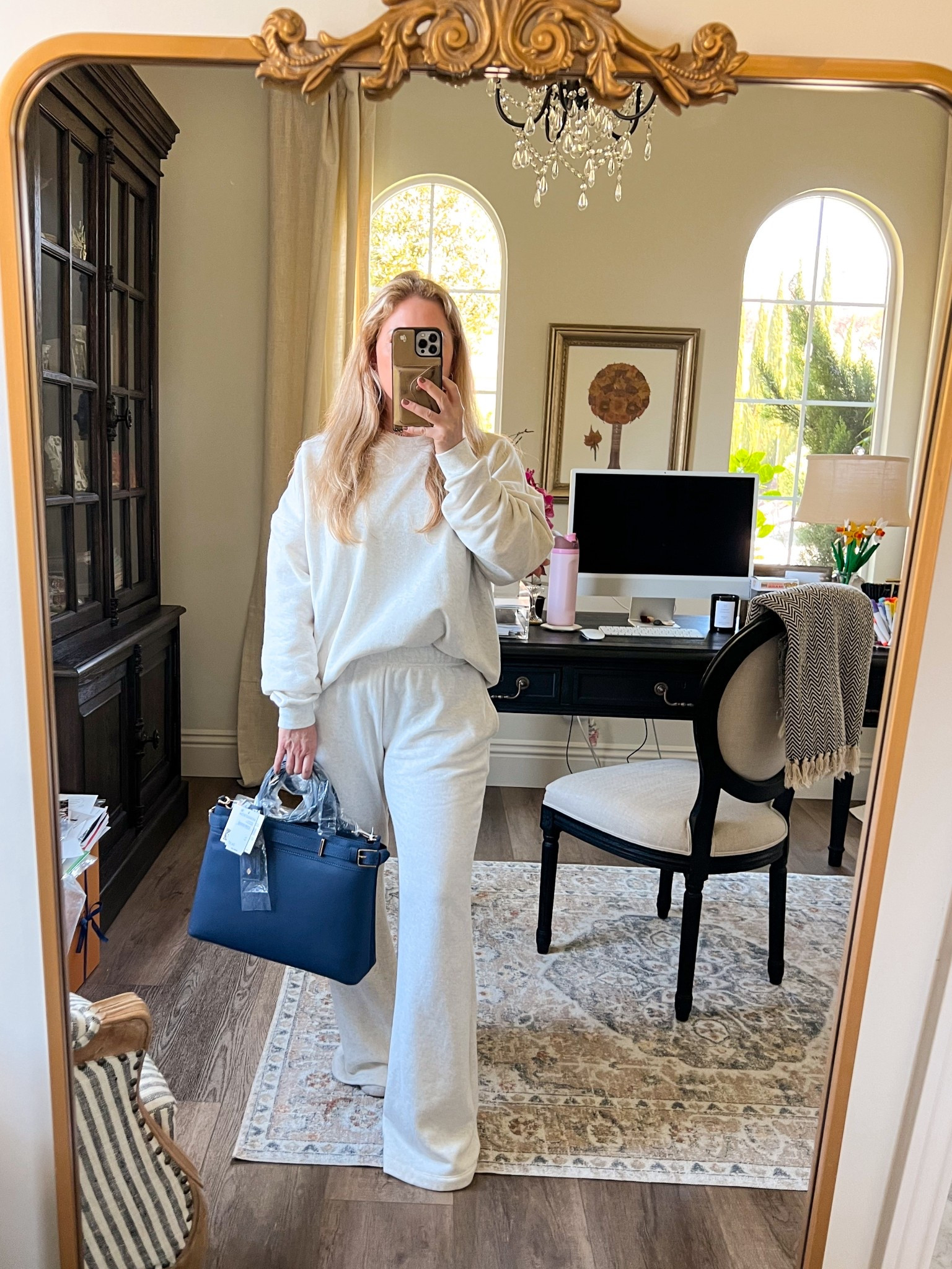 Casual outfit • Easy outfit • Sweatsuit • Travel outfit • Handbag • Crossbody bag (was $100 now $35 !!)

I am 5 foot two so these pants are a little long on me, but can easily be hemmed. 

#LTKTravel #LTKOver40 #LTKStyleTip