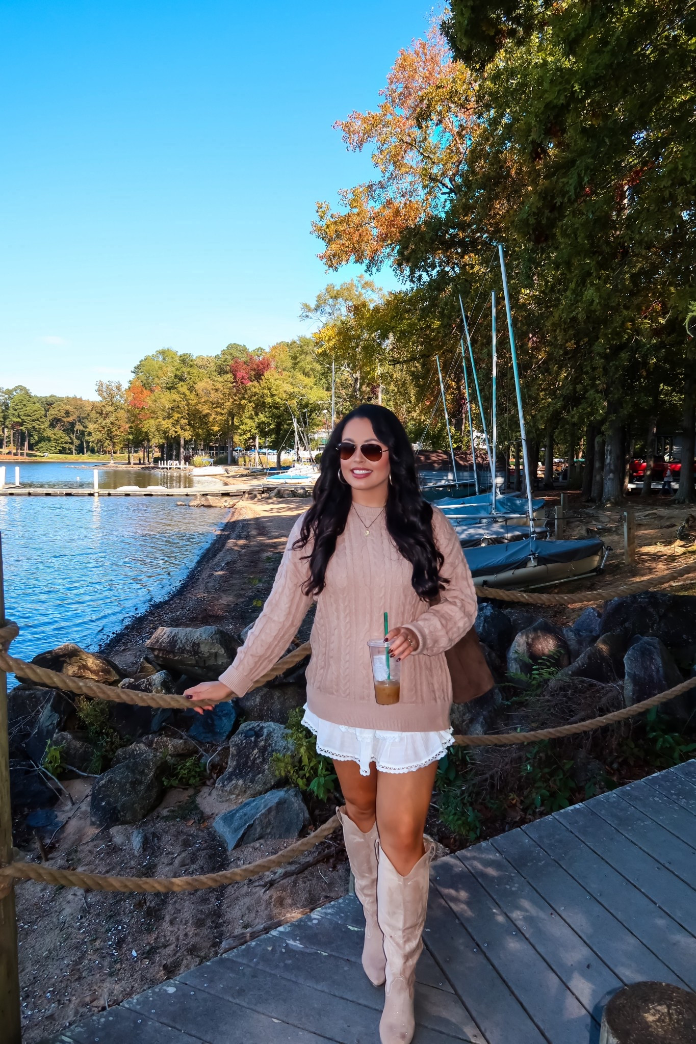 Under $30 Amazon white skort (medium), under $30 Amazon ribbed sweater (medium), under $60 Amazon western boots and rayban aviators #founditonamazon

#LTKootd #LTKSaleAlert #LTKmomlife