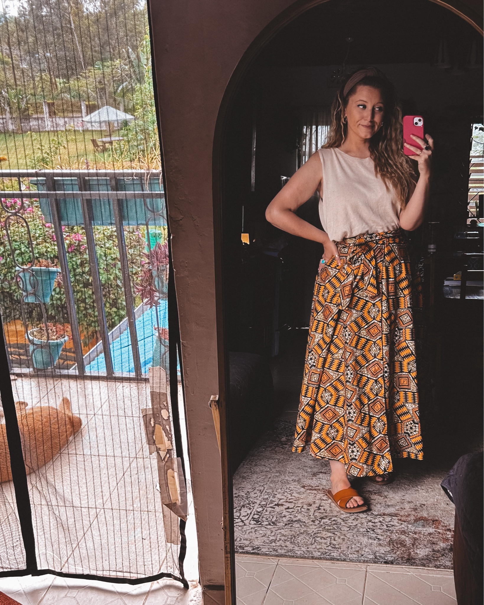 When your skirt’s handmade from the Maasai market and your tank is from the “I just woke up but still cute” collection.

This skirt was handmade at my favorite stall in Kenya—bold, bright, and perfect for art class, therapy chats, or chasing kids around after church.
Wearing my usual uniform: easy tank, slides I can sprint in, and a headband to pretend I’ve got it all together. Linking similar pieces for fellow teachers + counselors who dress with heart (and a little flair).

#LTKFamily #LTKMidsize #LTKStyleTip