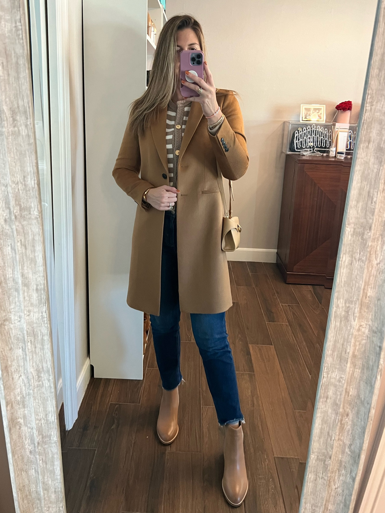 I said brrrr it’s cold in here! This camel pea coat is a necessity in your winter wardrobe, instantly elevating your look while easily matching everything you pair with it!

Coat: runs TTS. wearing size 6
Shirt: runs TTS. wearing size small 
Jeans: run TTS. Wearing size 28
Boots: run TTS and so so comfy!

#LTKStyleTip #LTKSeasonal #LTKOver40