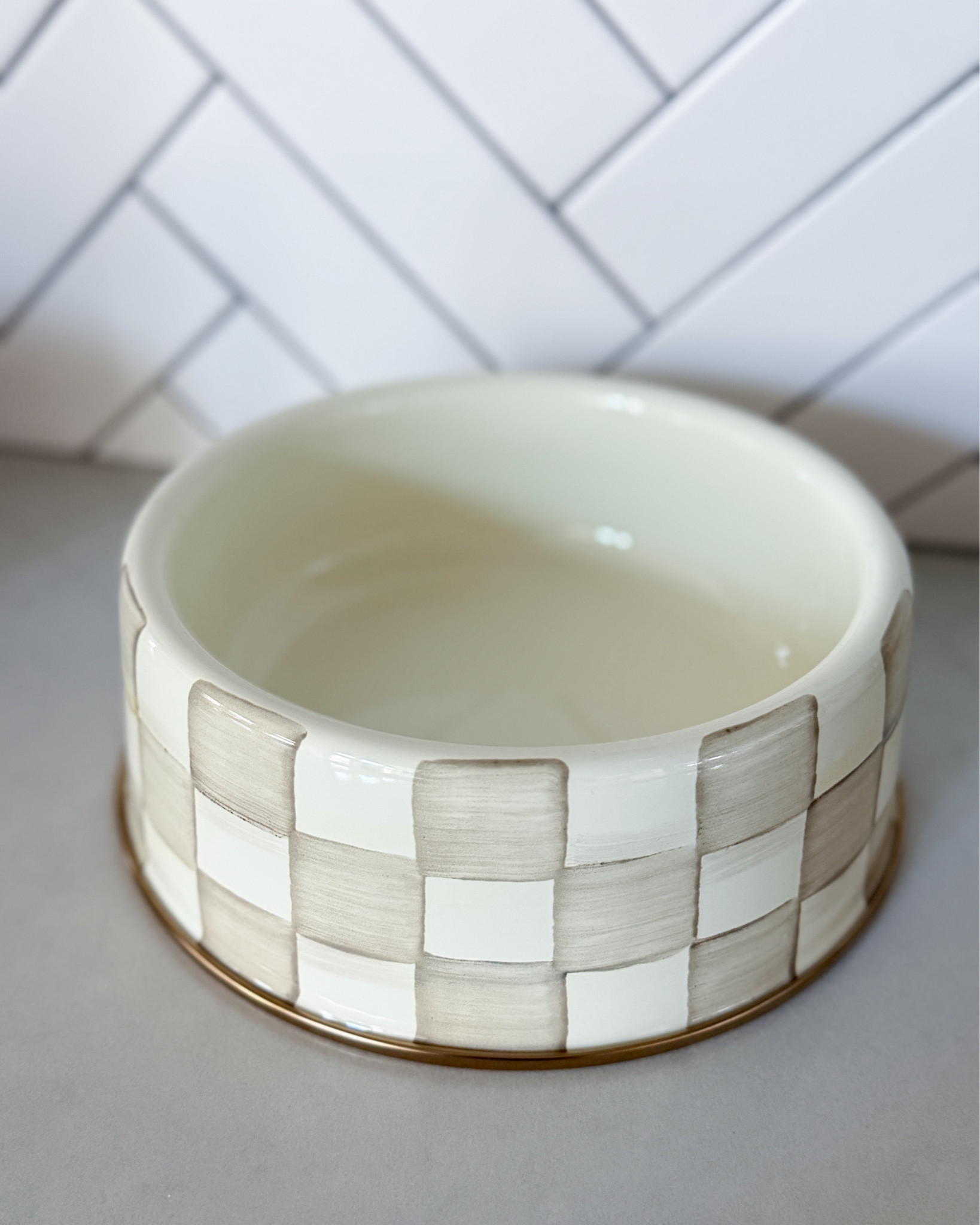 Skadi just got the most elevated food bowl situation. We got her the MacKenzie-Childs Mocha Check large pet bowl & it is SO good. The neutral checkered pattern fits right in with our home decor & the quality is just as amazing as everything else from this brand. It looks more like a piece of pottery you would display than a pet bowl, which is exactly what we were going for. If you have been on the fence about treating your pup to something special, this is it. Linked in my LTK!

MacKenzie-Childs pet bowl - mocha check pet bowl - designer dog bowl - checkered pet bowl - aesthetic dog bowl - elevated pet accessories - luxury pet decor - neutral home pet bowl - large dog bowl - MacKenzie-Childs check - pet home decor - stylish pet accessories - dog mom finds - home decor & pet - neutral pet aesthetic - cozy home pet bowl - designer pet finds - dog bowl inspo - MacKenzie-Childs mocha - pet bowl neutral

#LTKstorytime #LTKHome #LTKvlog