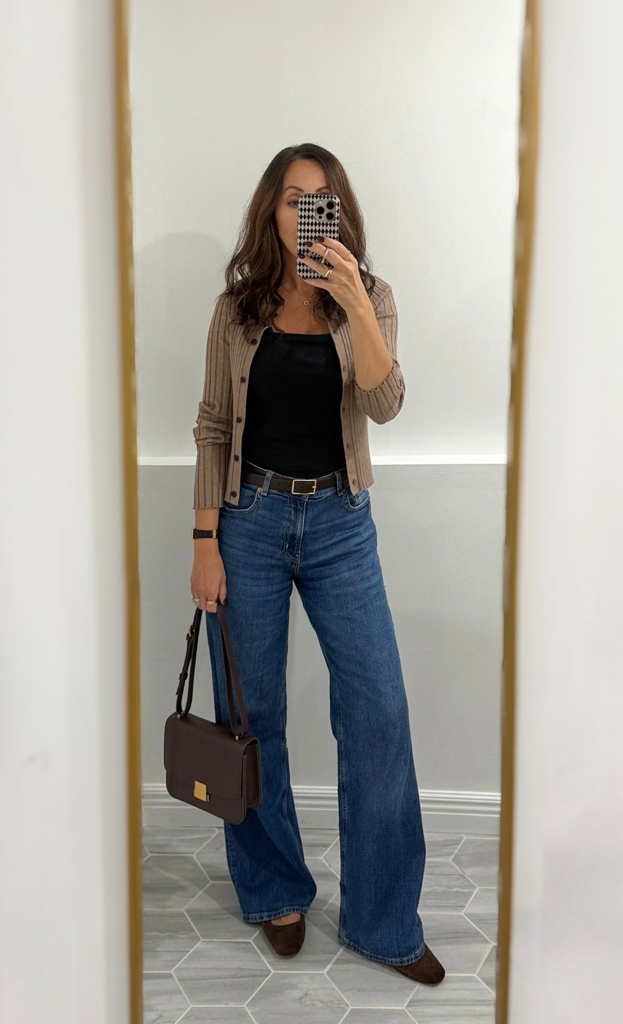 Ribbed Cardigan in xs - has nice stretch to it.  
I sized up in flats. 
Xs in black tee. 
H&M jeans in their size 8 and it’s a relaxed fit (I’m usually size 26 in jeans). I’m 5’6 and jeans are long. 

#LTKItBag #LTKSaleAlert #LTKFindsUnder100