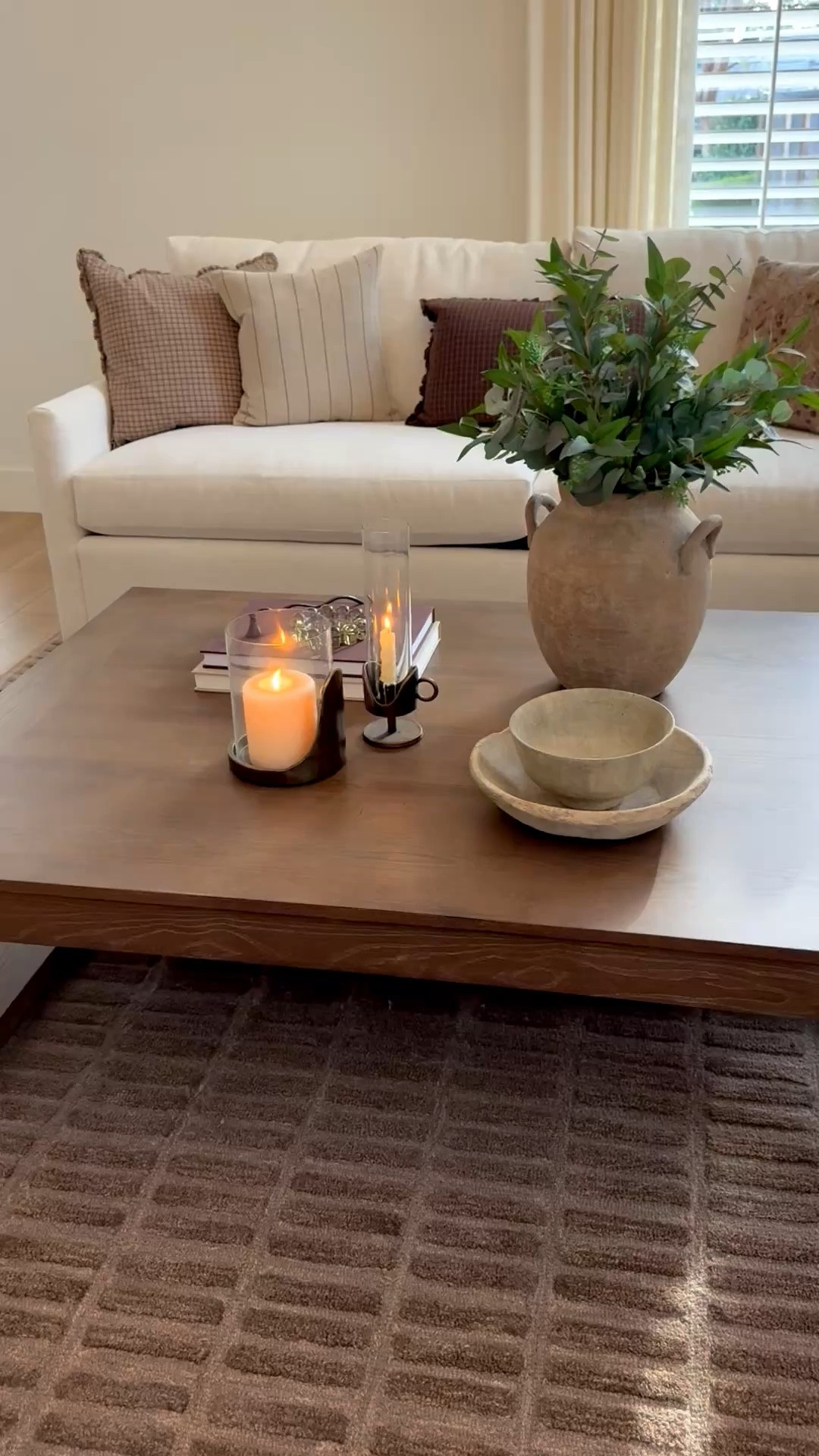 Living room decor. Warm tones throw pillows, sofa, coffee table decor. 

#LTKHome #LTKU