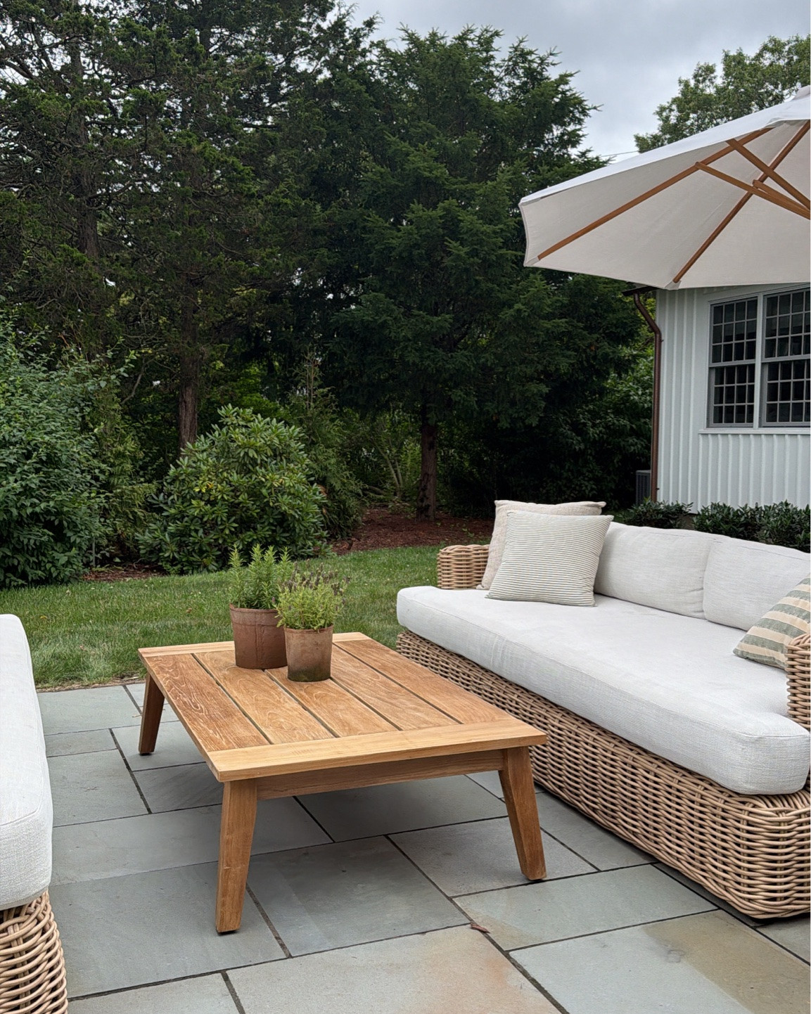 love the size and design of this outdoor coffee table. the scale is perfect paired with these outdoor sofas, which are pretty substantial.

#LTKSeasonal #LTKHome #LTKSaleAlert