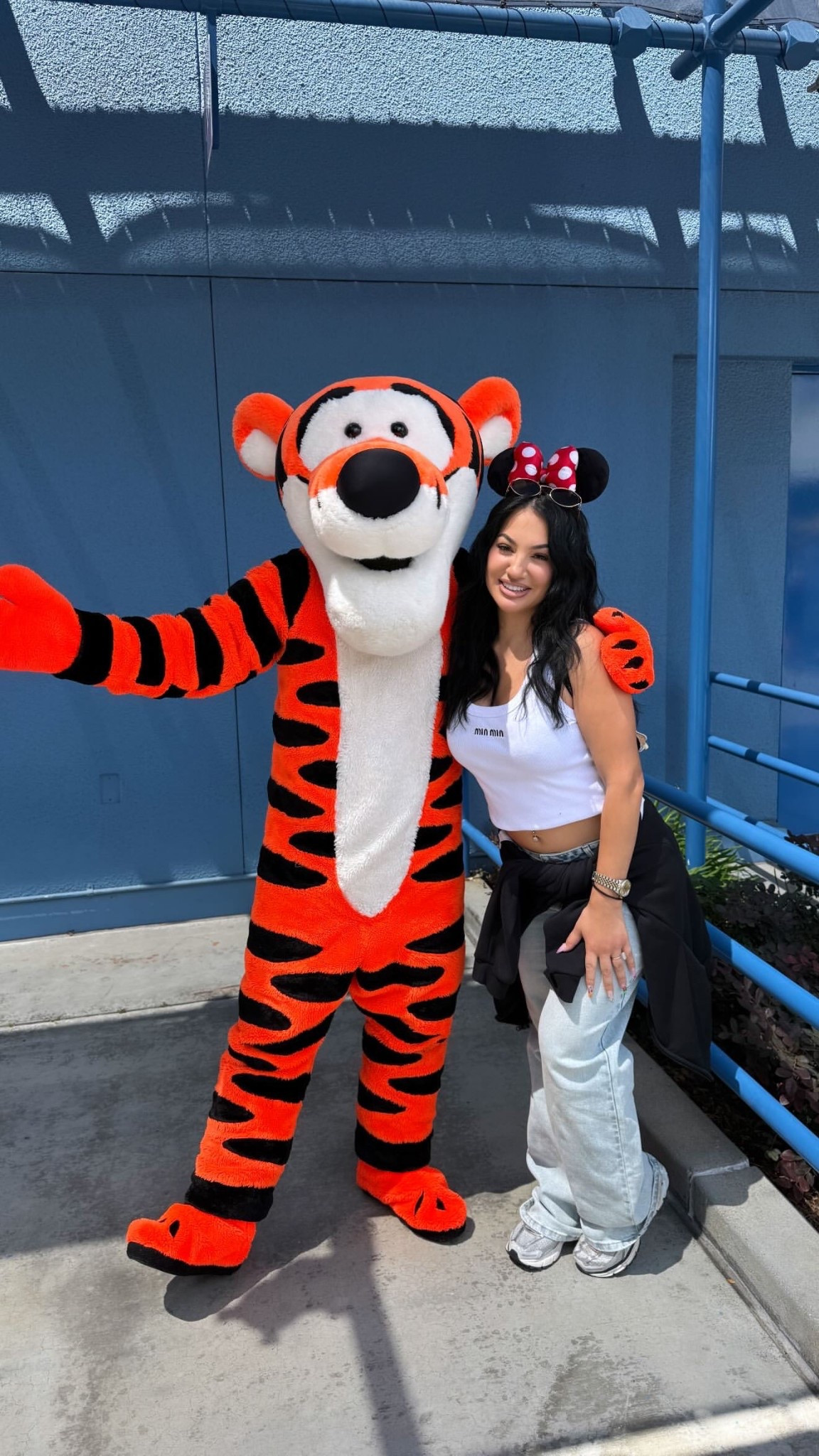 An outfit comfy enough to run around in all day long at Disneyland! Love this white Miu Miu tank 🤍

#LTKStyleTip #LTKShoeCrush #LTKSeasonal