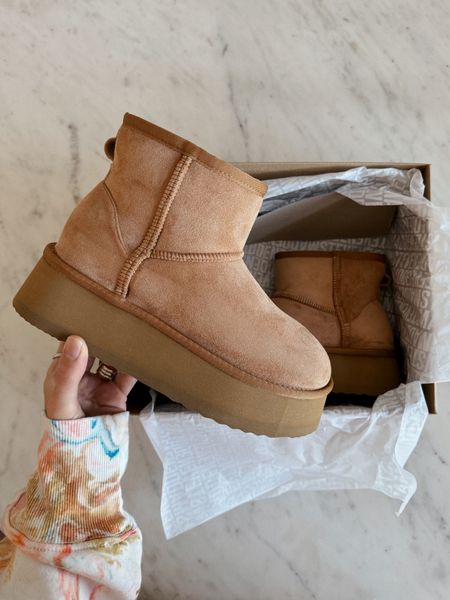 Steve Madden coming in with these Ugg platform lookalikes for a fraction of the price!! Have my true size 7 and they fit tts  

#LTKfindsunder100 #LTKshoecrush