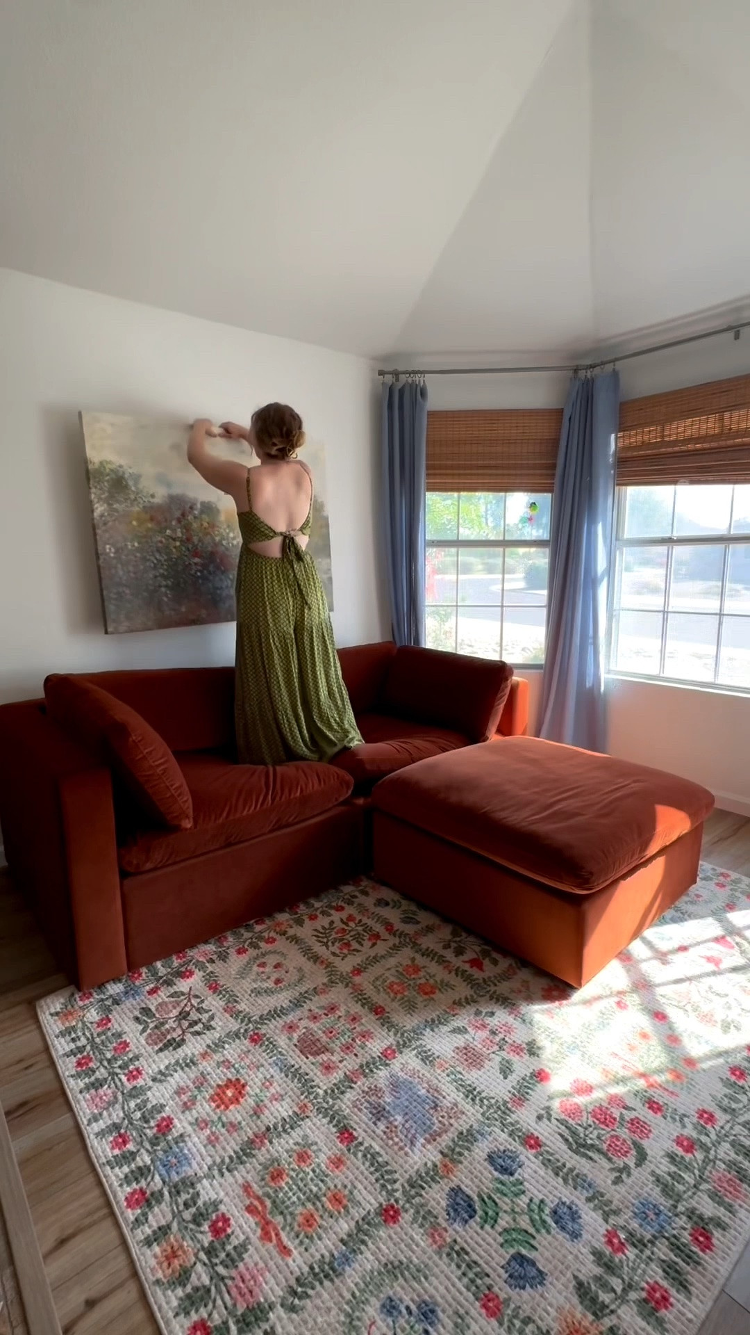 transformed our little sunroom nook to a whimsical cozy sitting space. bold color sofas. floral area rug (washable too!) blue curtains. wall art. red velvet sofa.

#LTKSeasonal #LTKHome #LTKSaleAlert
