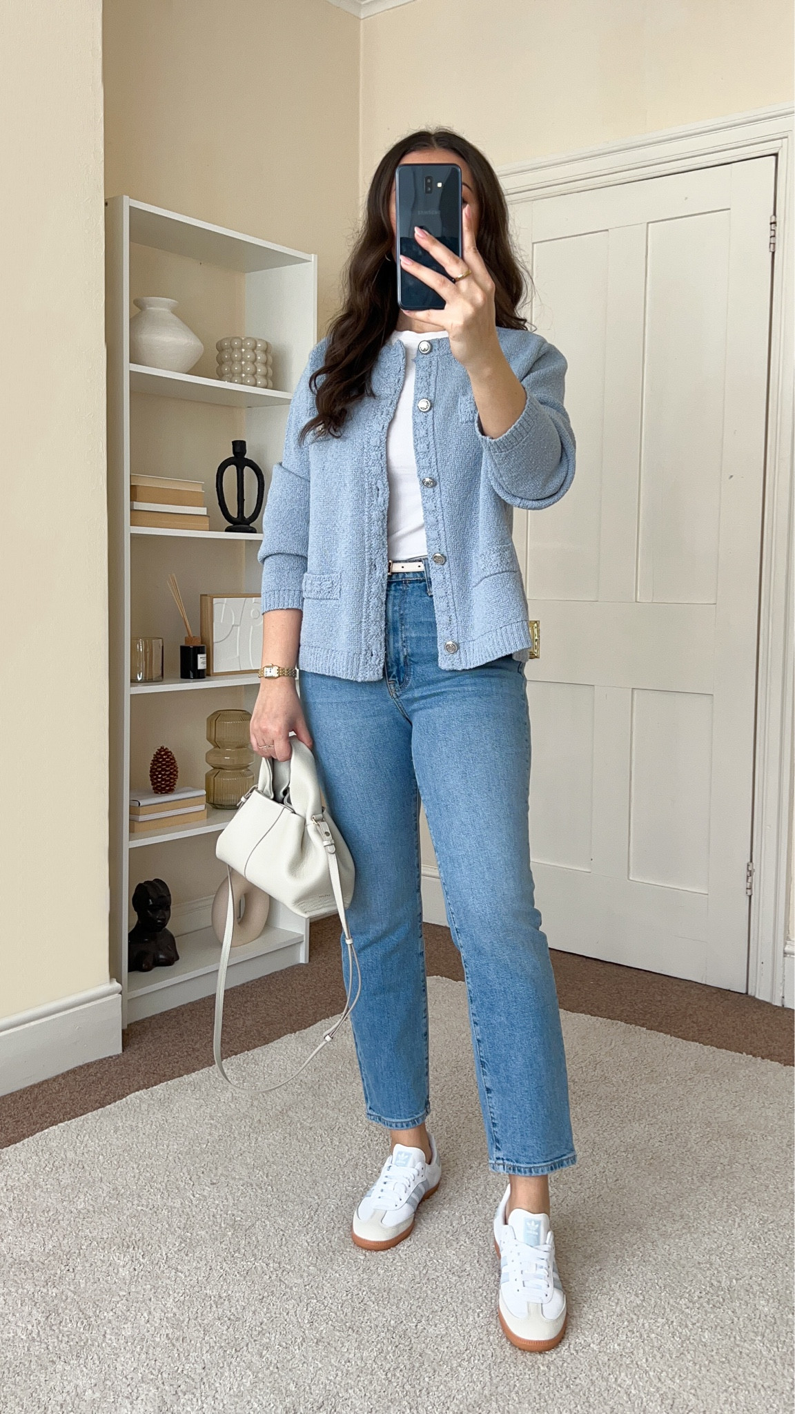 Casual everyday early Spring outfit.
T-shirt is from H&M, wearing size S. Cardigan is from H&M, wearing size S. Jeans are from Mango, wearing size UK12. Trainers are from Adidas. Handbag is from Polene Paris and cannot be linked on LTK, I’ve linked similar .

#LTKfindsunder100 #LTKstyletip #LTKeurope