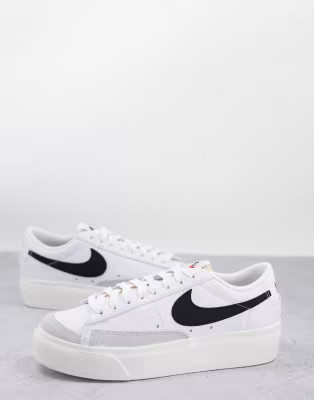 Nike Blazer Low Platform sneakers in white/black | ASOS (Global)