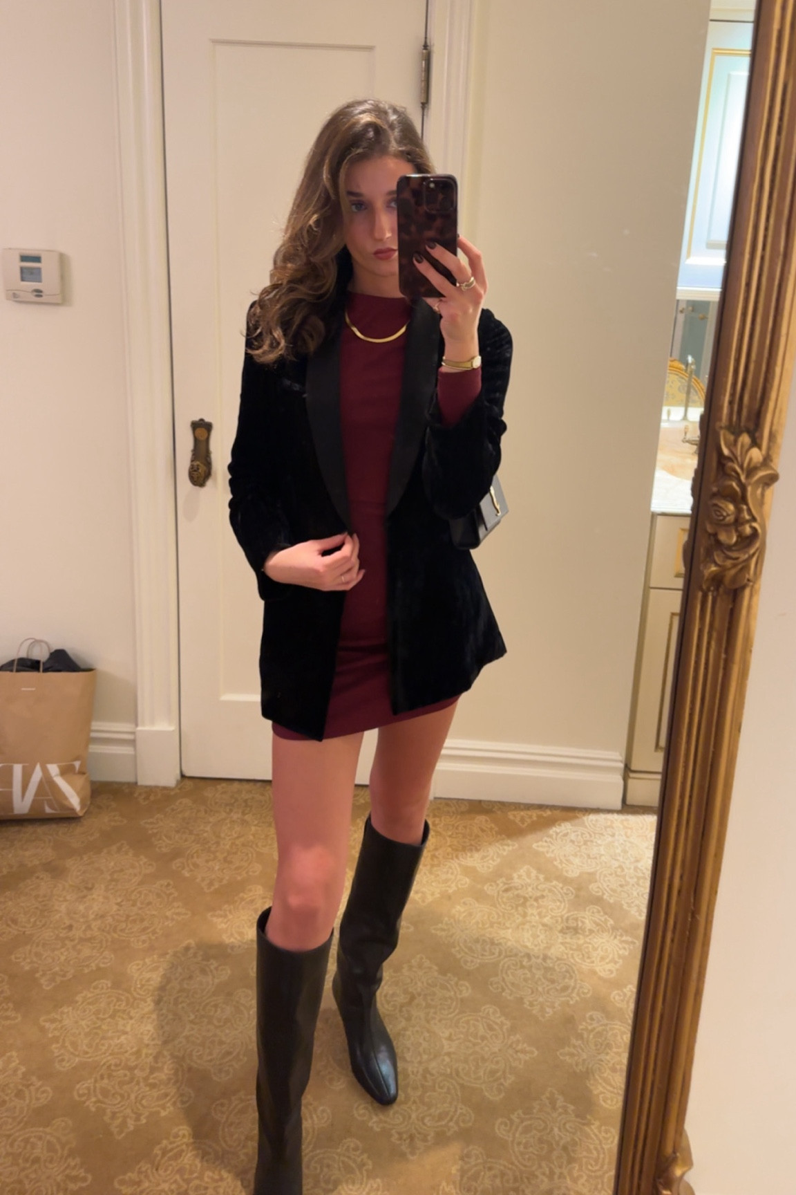 Burgundy long sleeve dress with black tall boots and blazer. Gold chain jewelry. New york outfit. Winter outfit. Blazer outfit. Cold weather outfit. Sustainable fashion. Layering outfits. Vintage-inspired styles. Minimalist wardrobe. Boho chic. Street style trends. Capsule wardrobe ideas. Athleisure looks. Fall fashion trends. Statement accessories. Oversized blazers. Monochromatic outfits. Colorful knitwear. Trendy loungewear. Denim jackets. Eco-friendly fabrics. Work-from-home outfits. Accessories styling. Seasonal outfits. Valentines outfits. Valentines date outfits 

#LTKStyleTip